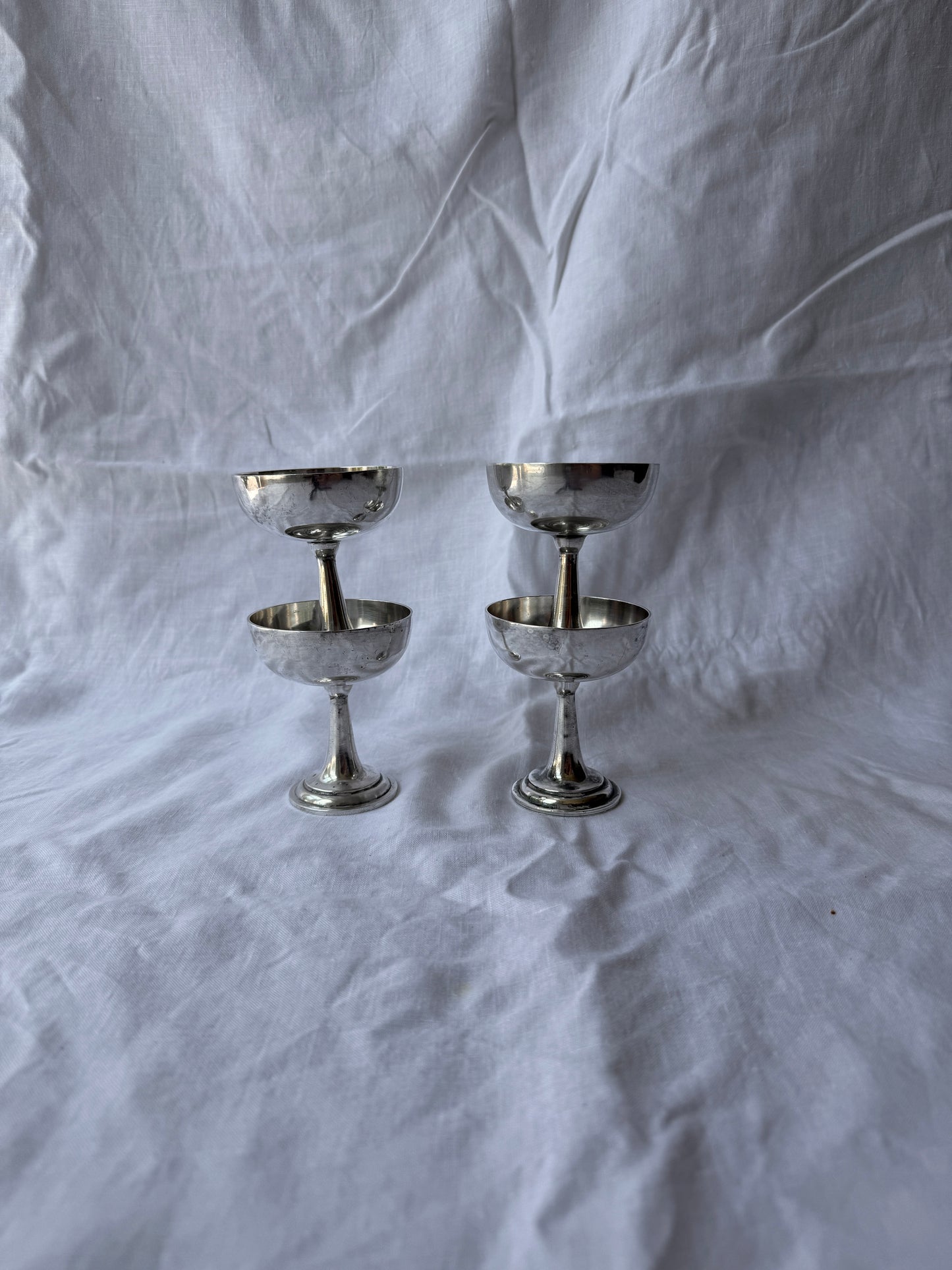 Set of 4 polished silver coupes
