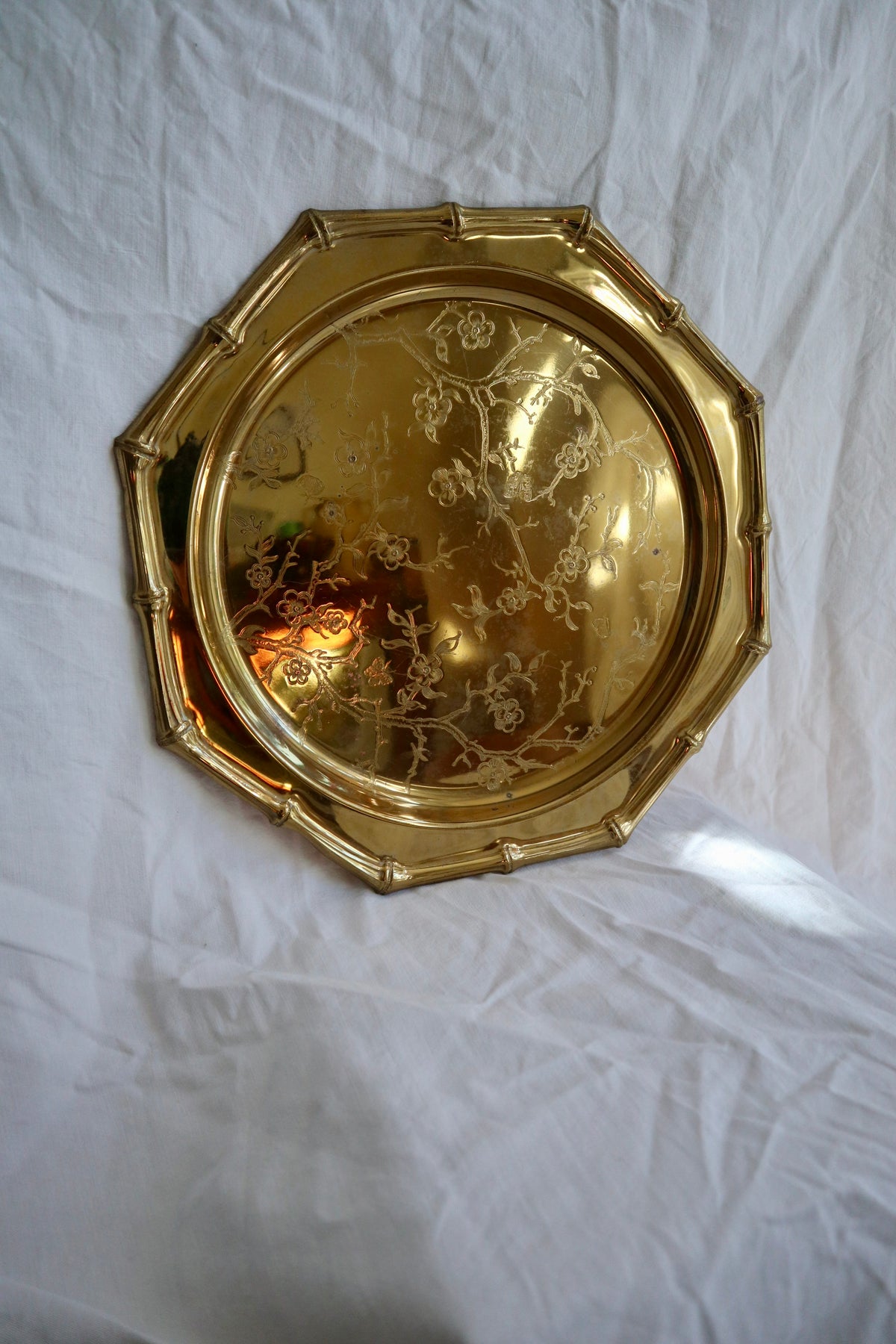 Brass tone platter with bamboo edge
