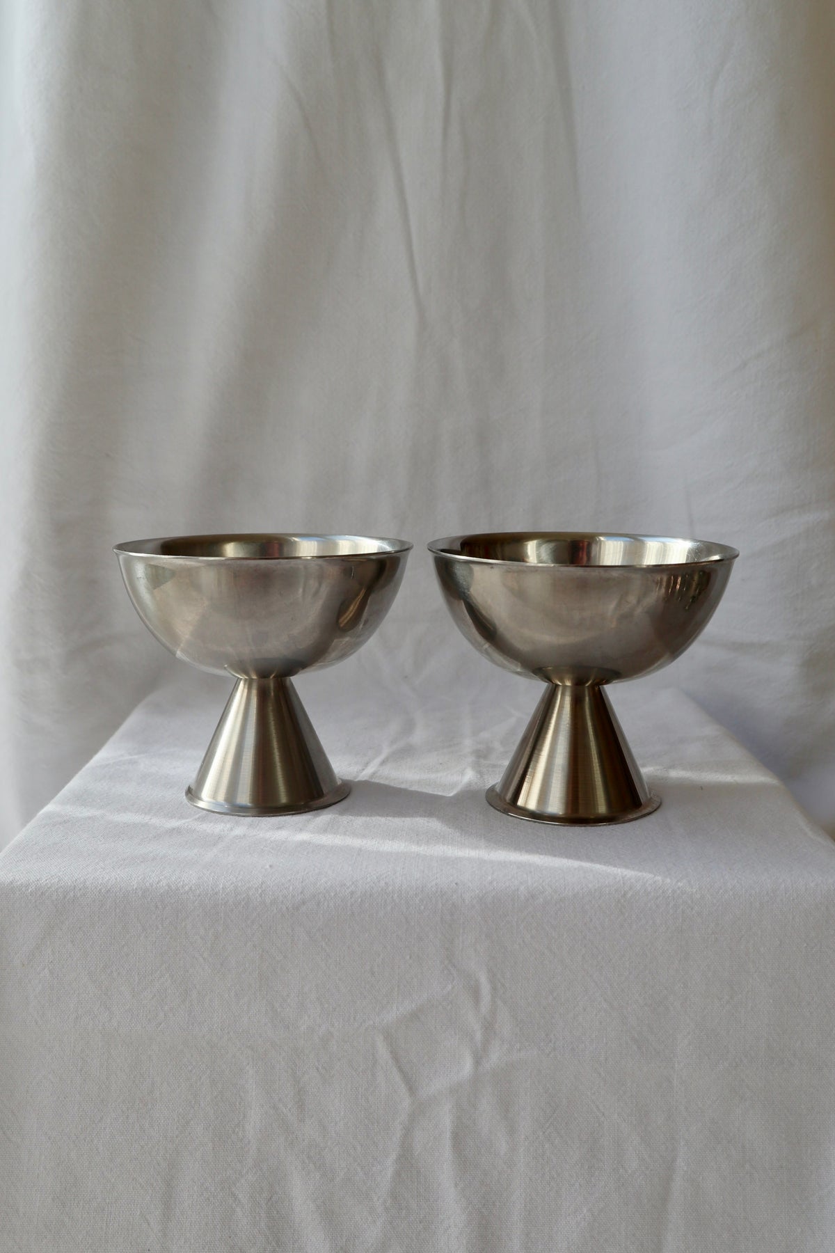 Set of 4 architectural stainless steel coupes