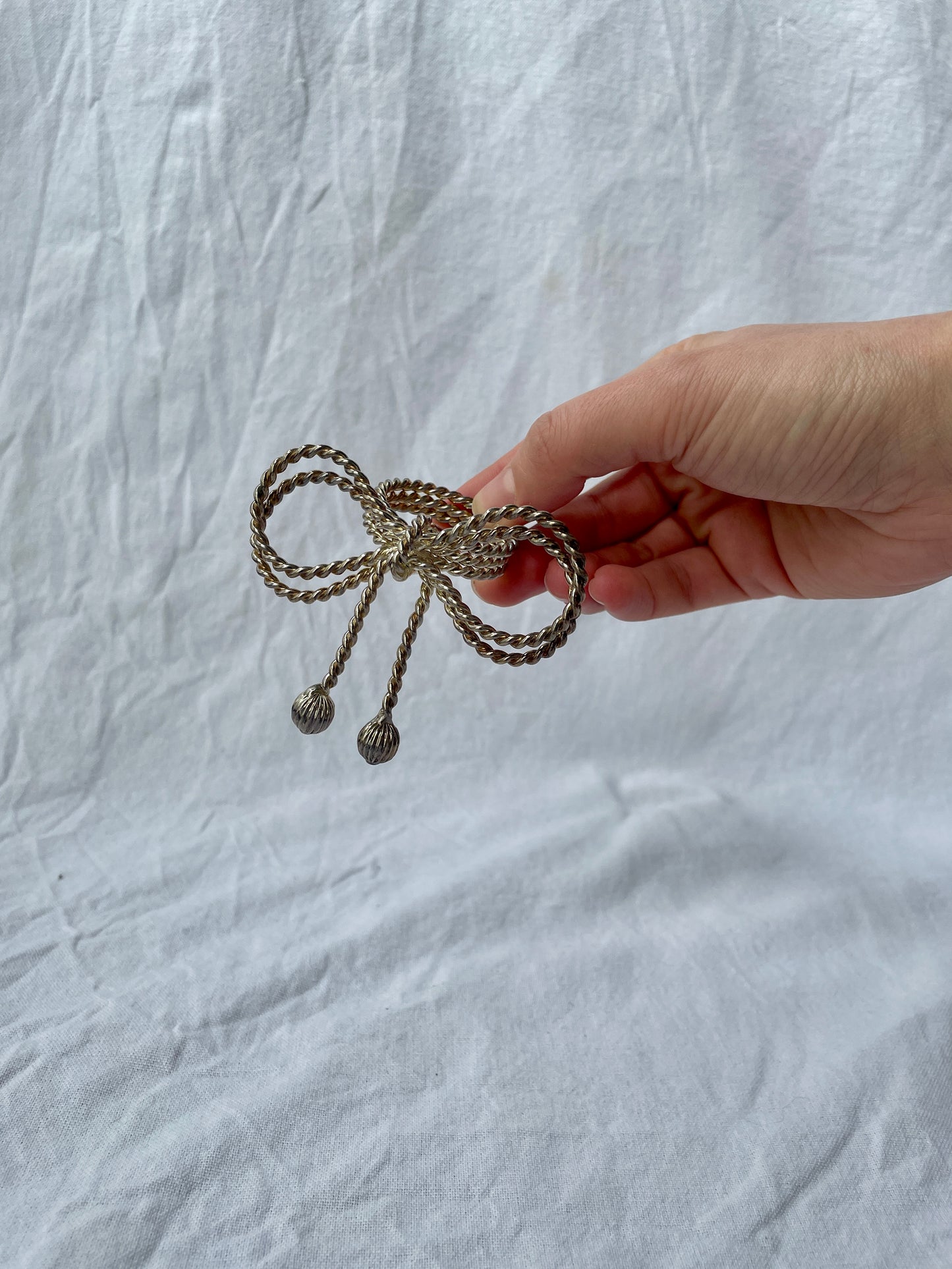 Braided bow napkin rings