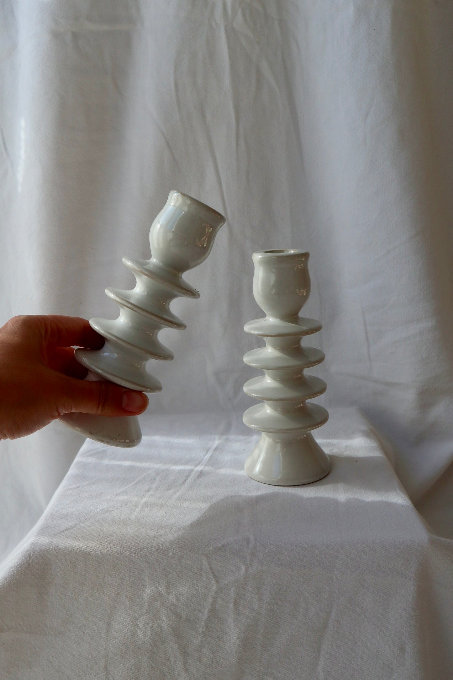 Pair of white ceramic hooped candleholders