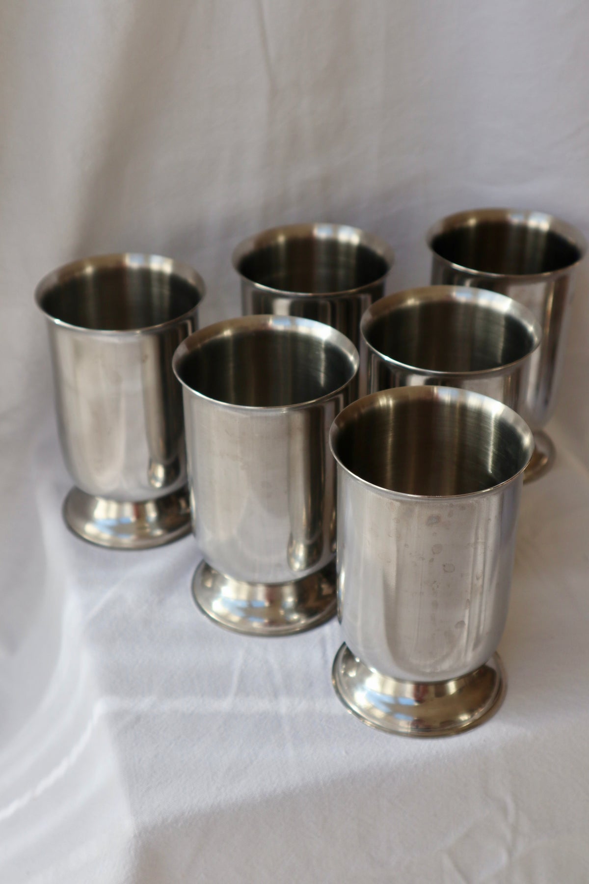 Set of 4 stainless steel mid century cups