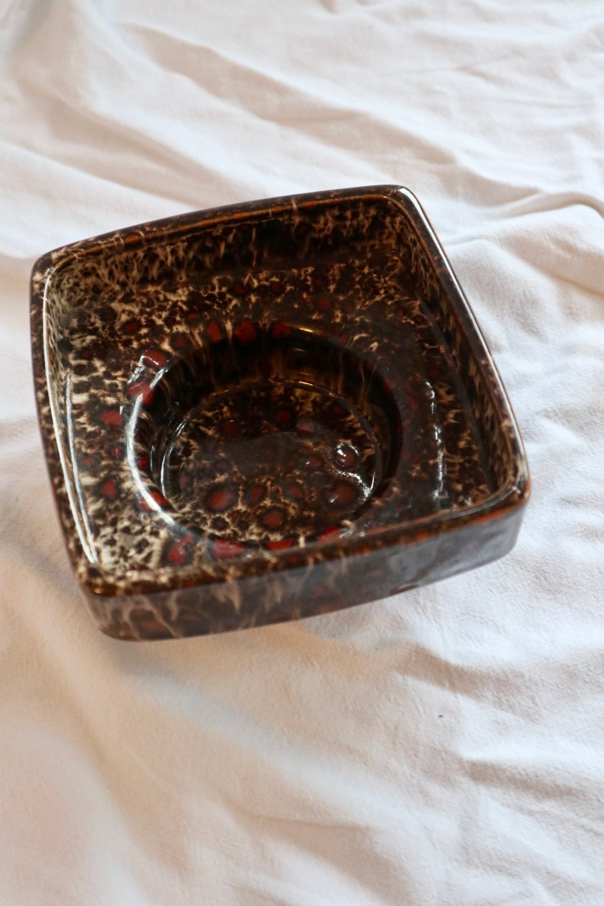 Mid-century studio pottery slipware pedestal dish
