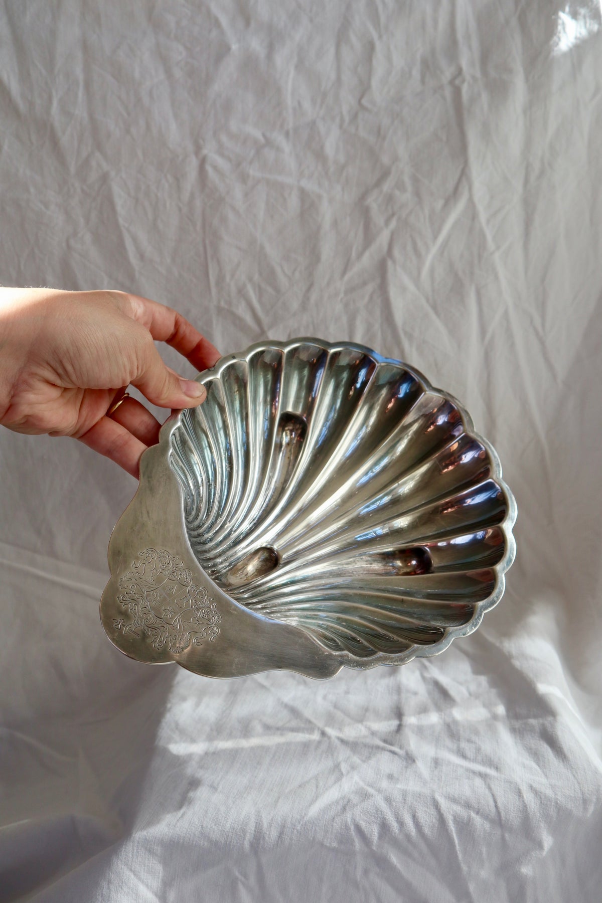 Silver plated shell bowl with engraved crest