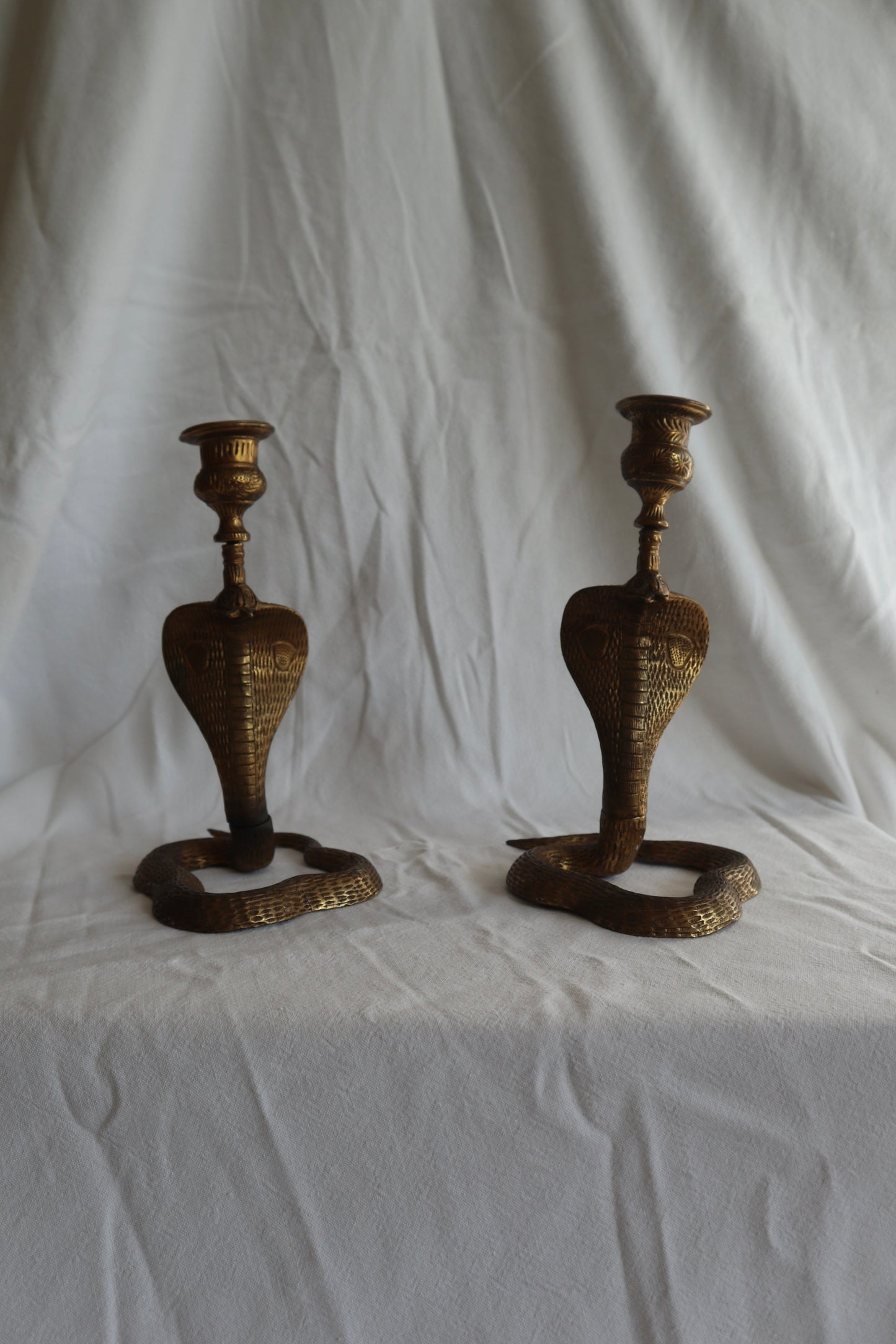Pair of vintage brass snake candlesticks