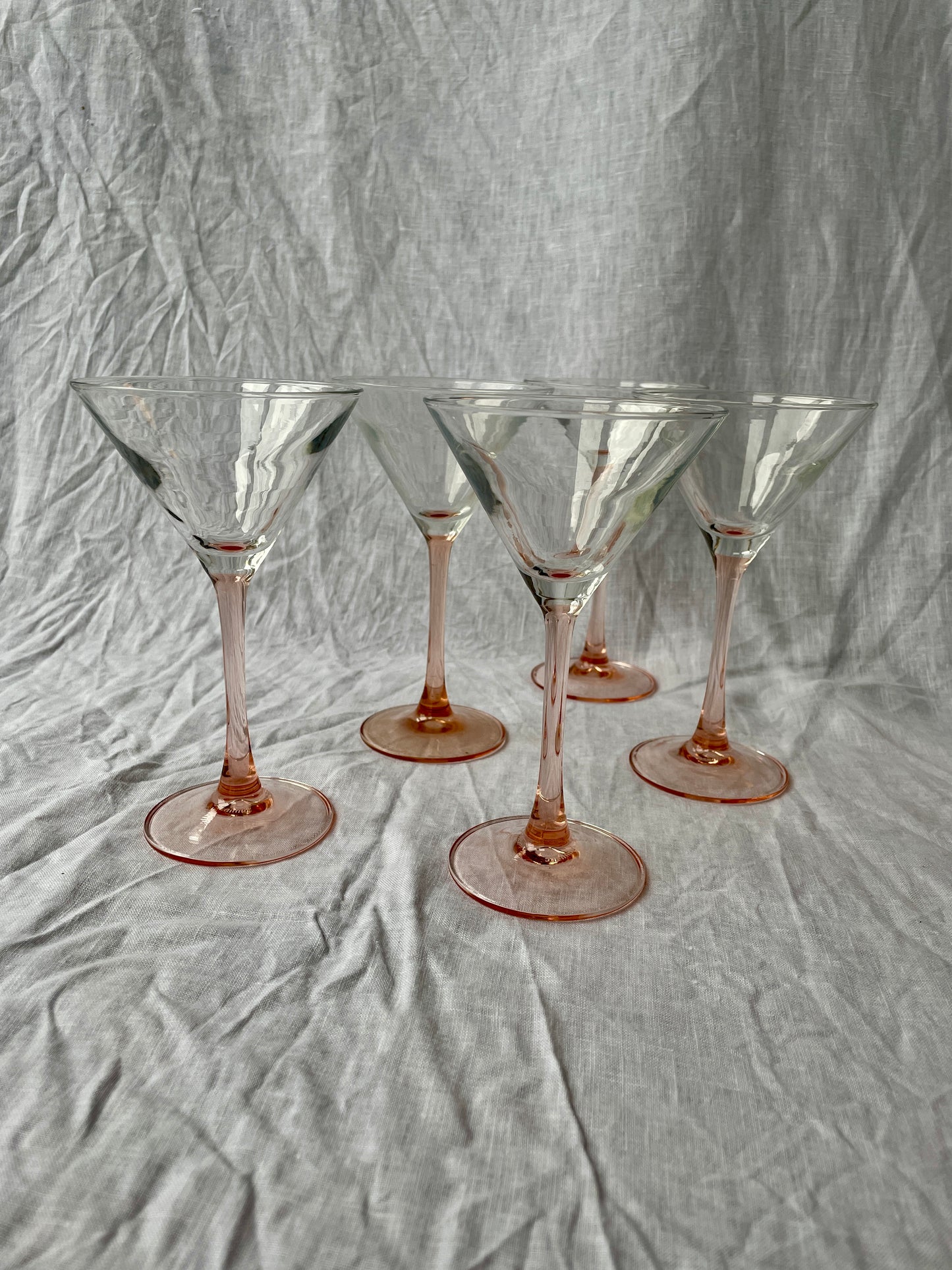 Pink stemmed martini glasses