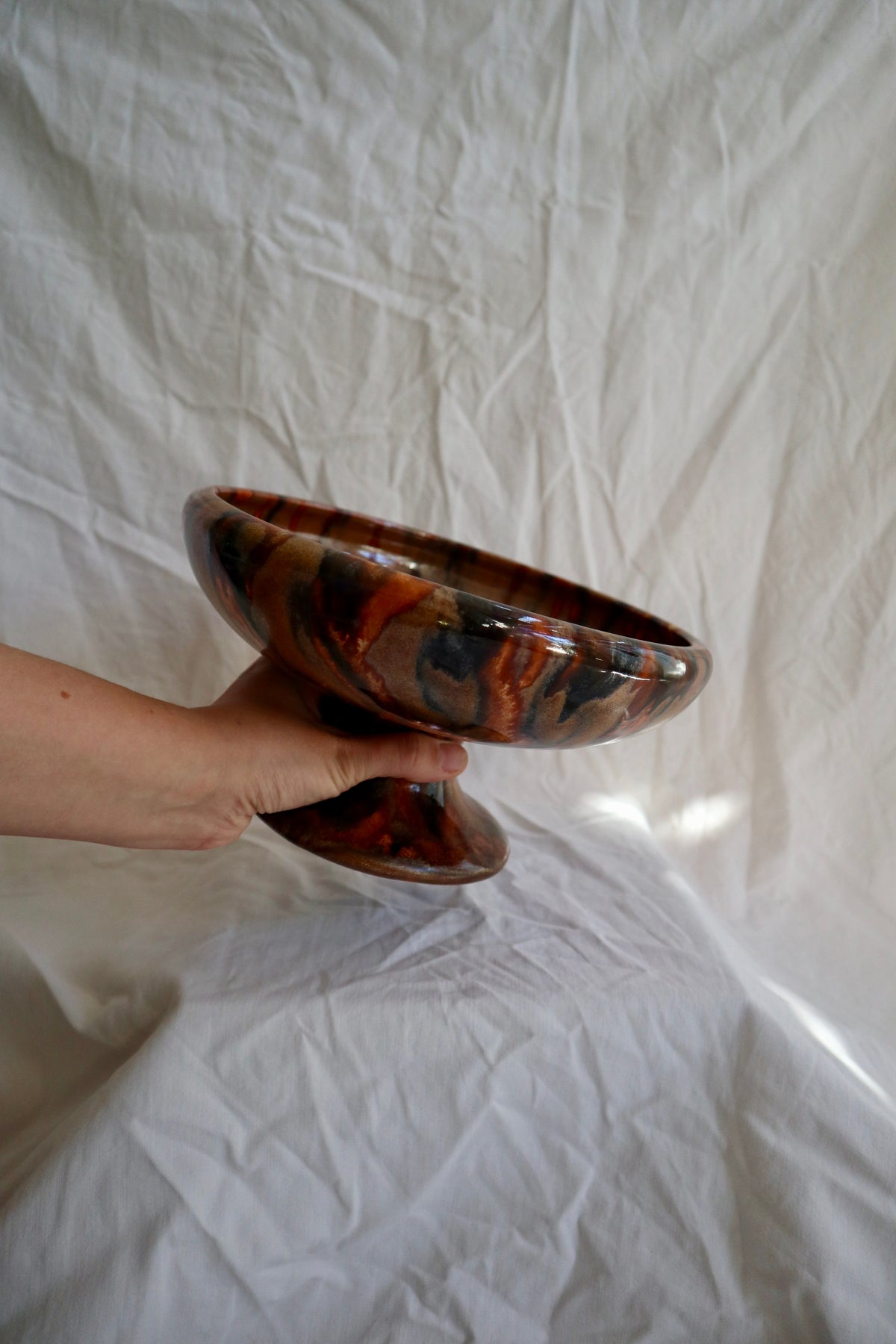 Tortoiseshell glaze slipware pedestal bowl