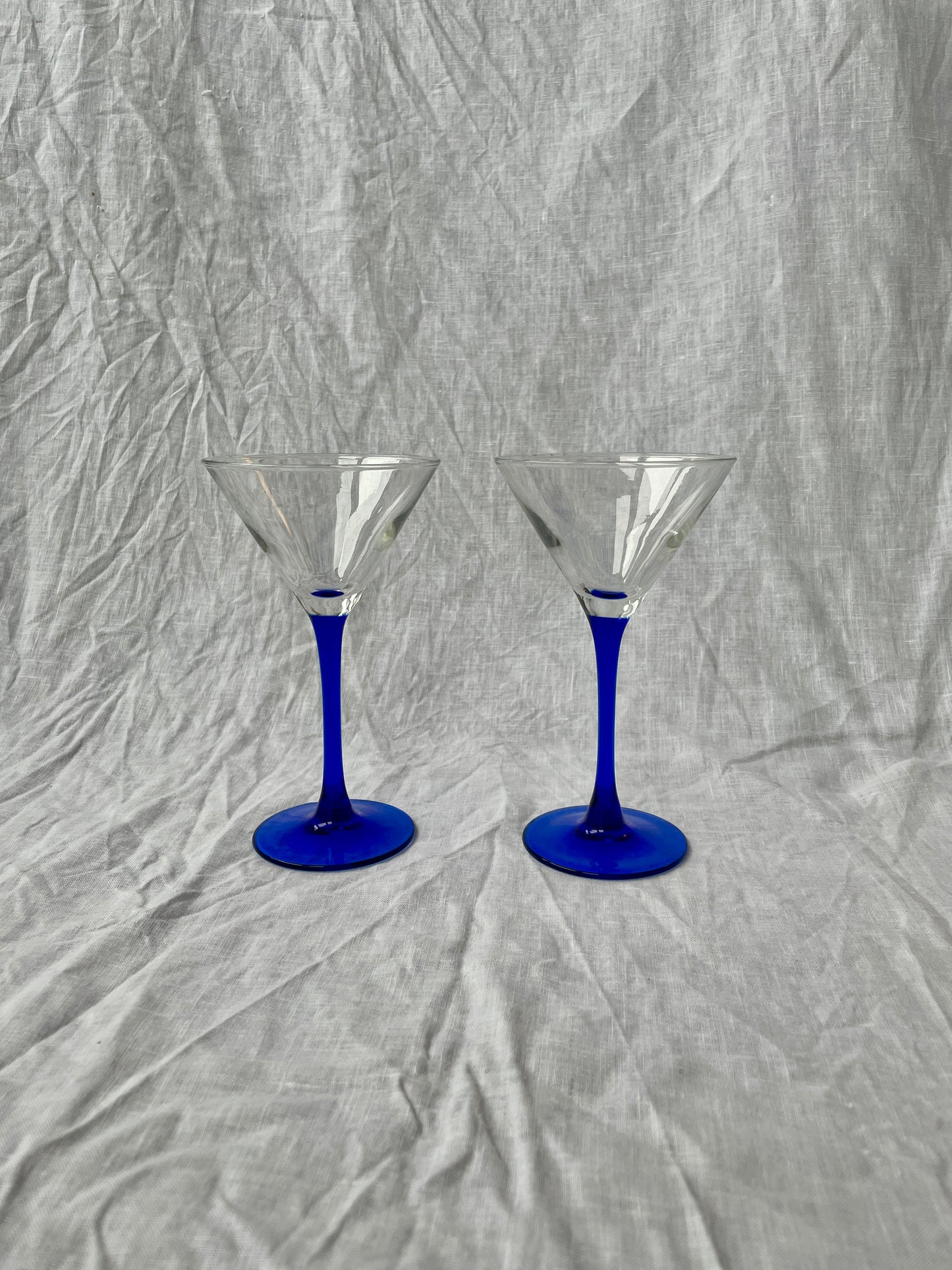 Blue stemmed martini glasses