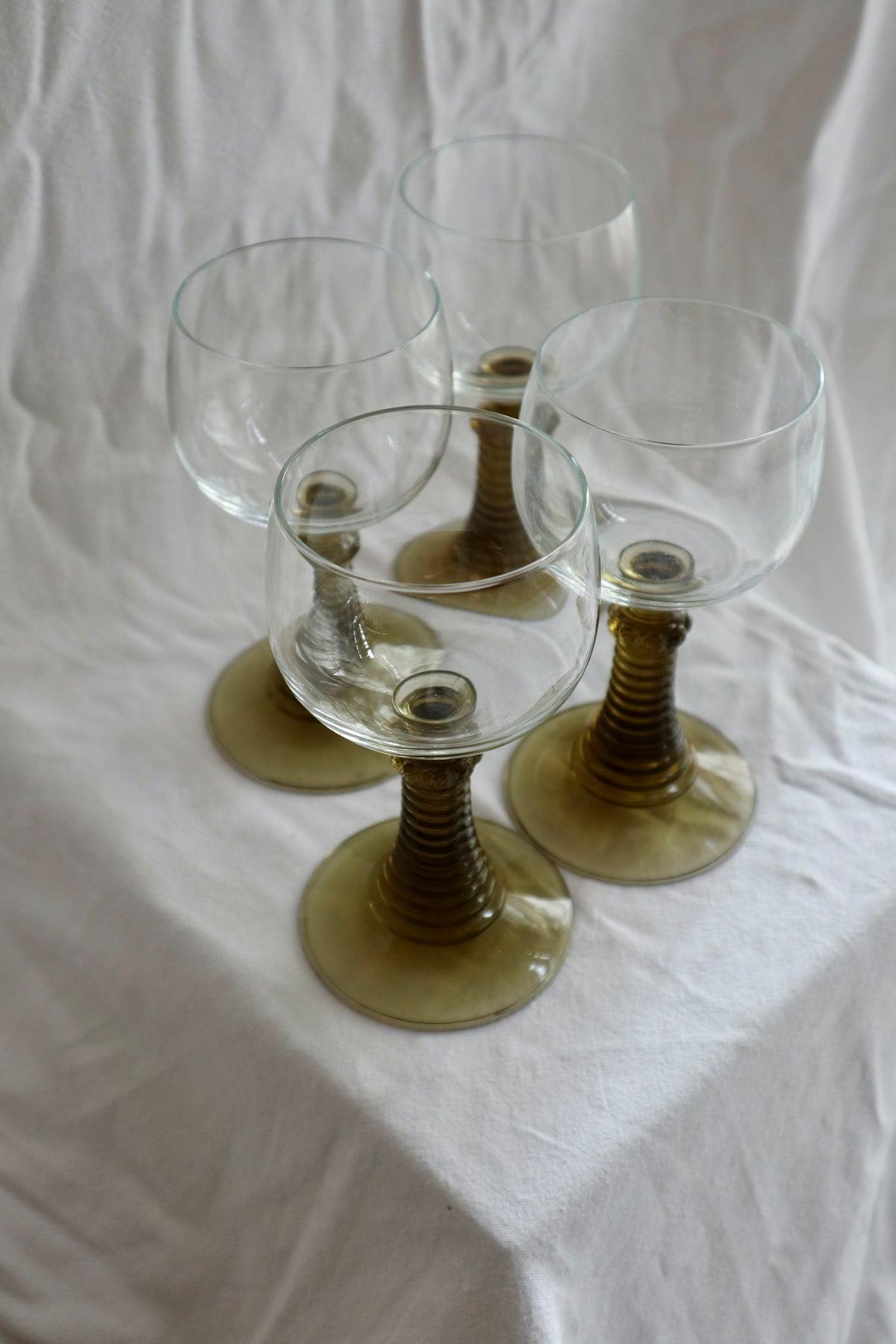 Set of four mid-century wine glasses with bobbin stems