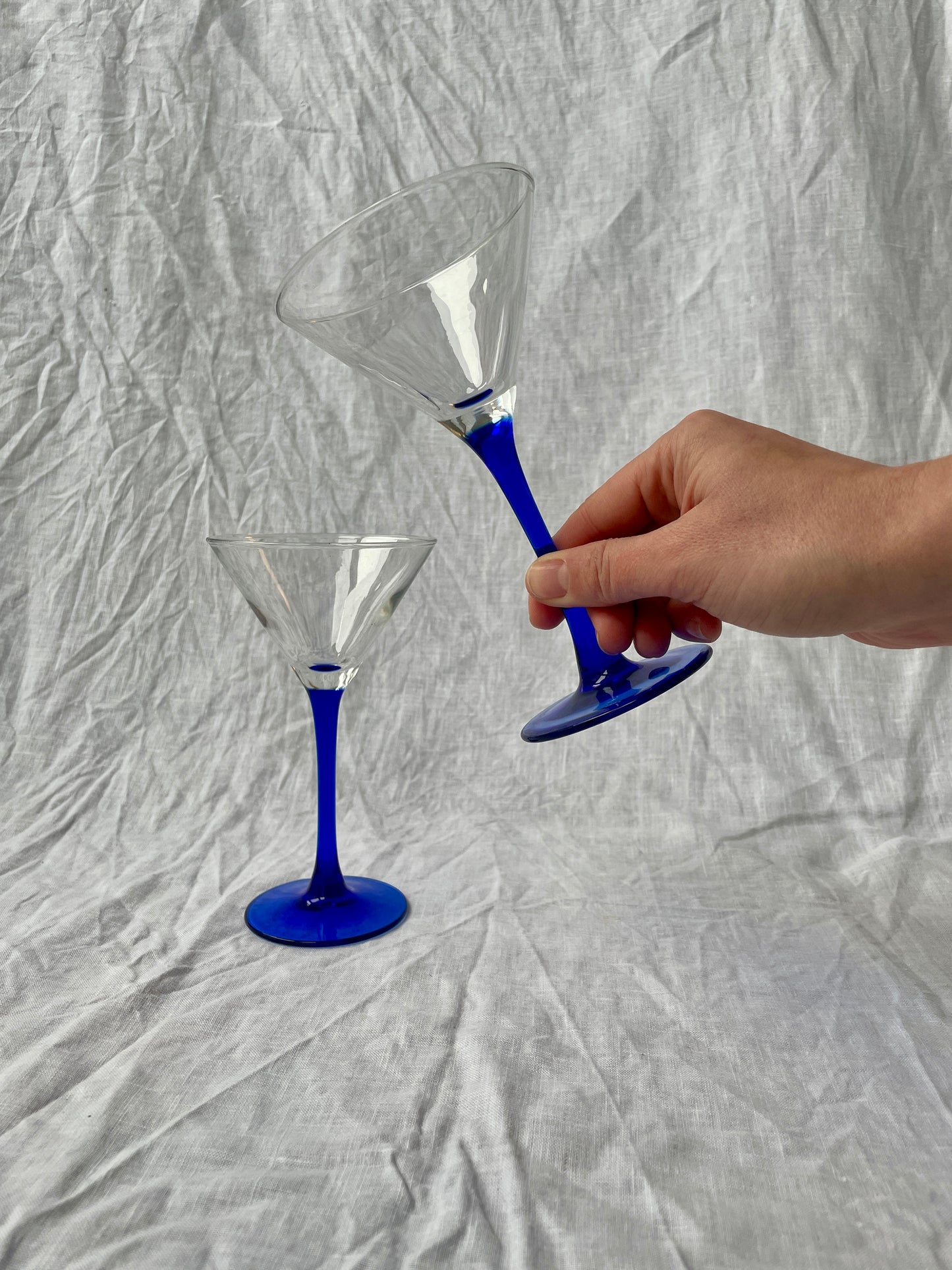 Blue stemmed martini glasses