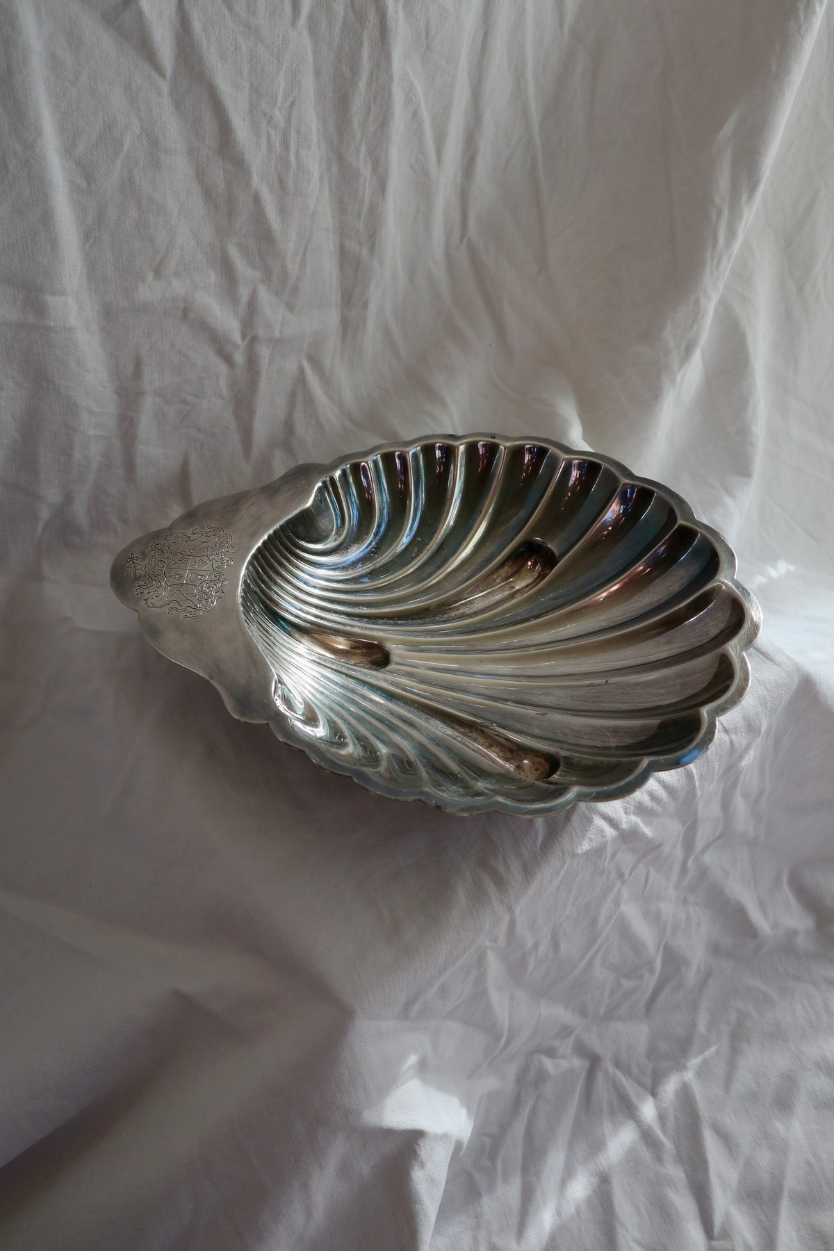 Silver plated shell bowl with engraved crest