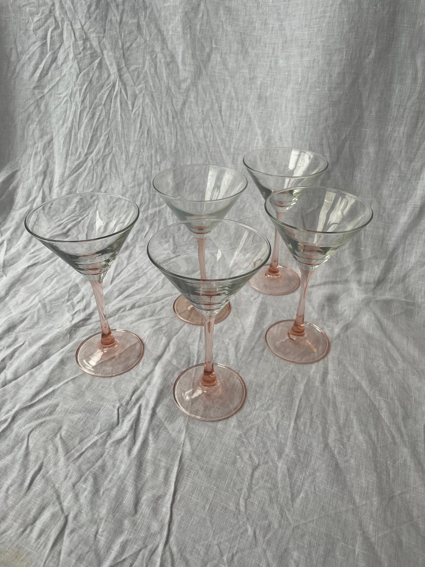 Pink stemmed martini glasses