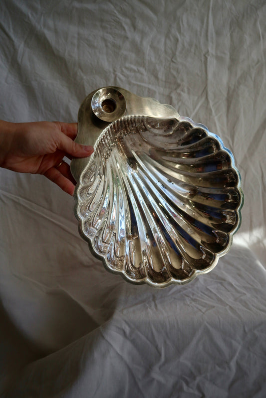 Large silver shell serving platter with candleholder