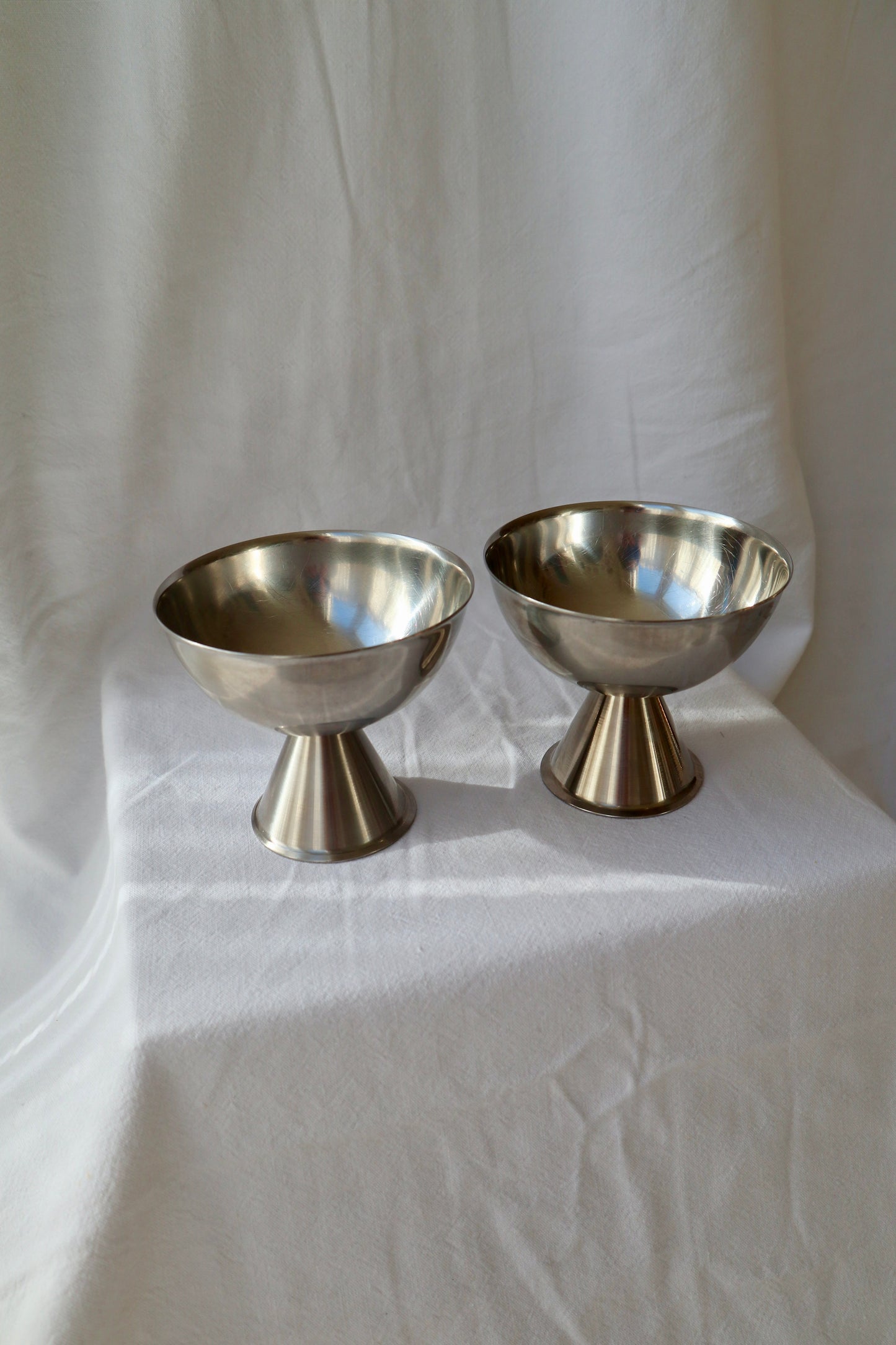 Set of 4 architectural stainless steel coupes