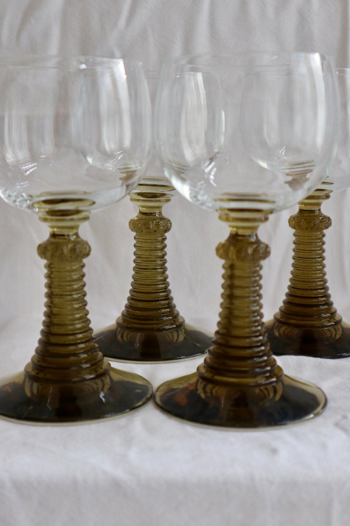 Set of four mid-century wine glasses with bobbin stems