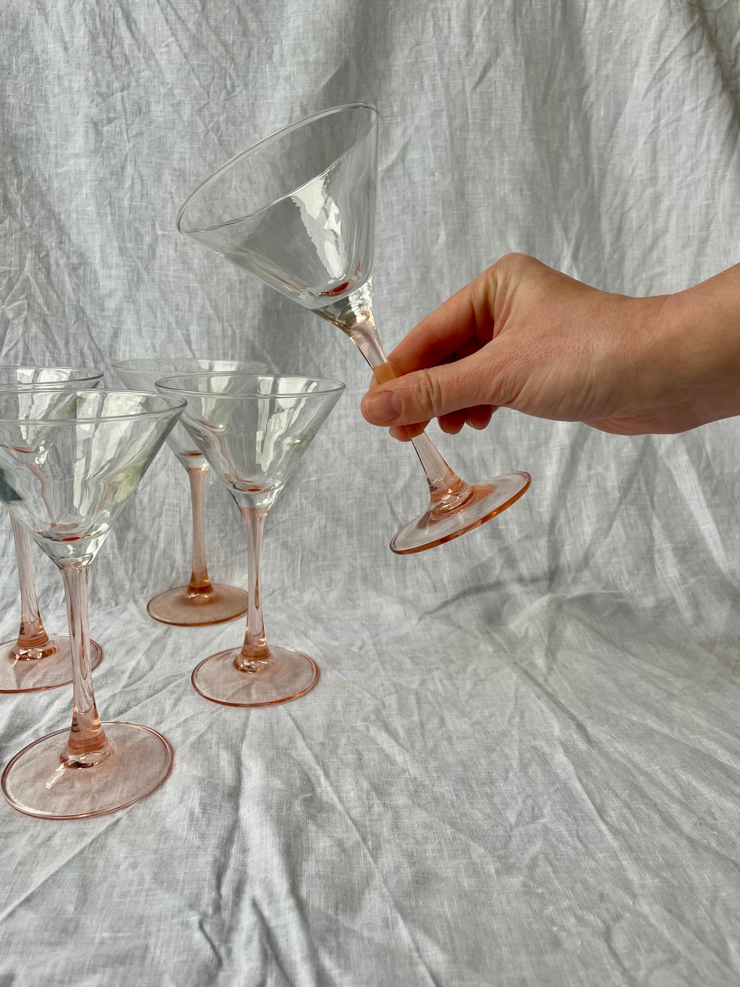 Pink stemmed martini glasses