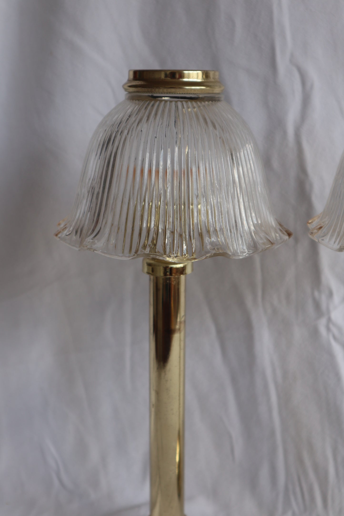 Pair of large brass-tone and ribbed glass vintage candle lamps