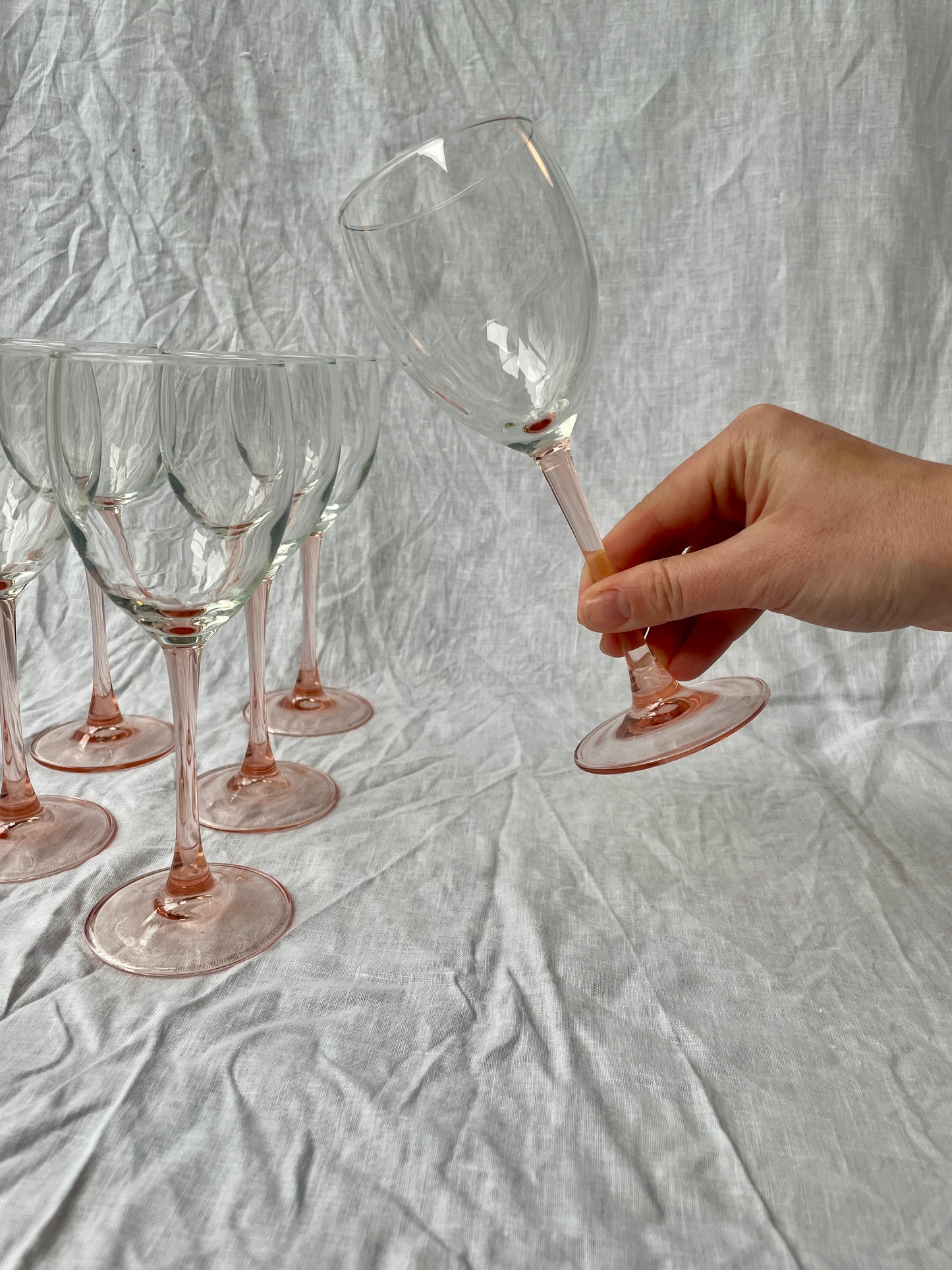 Pink stemmed wine glasses