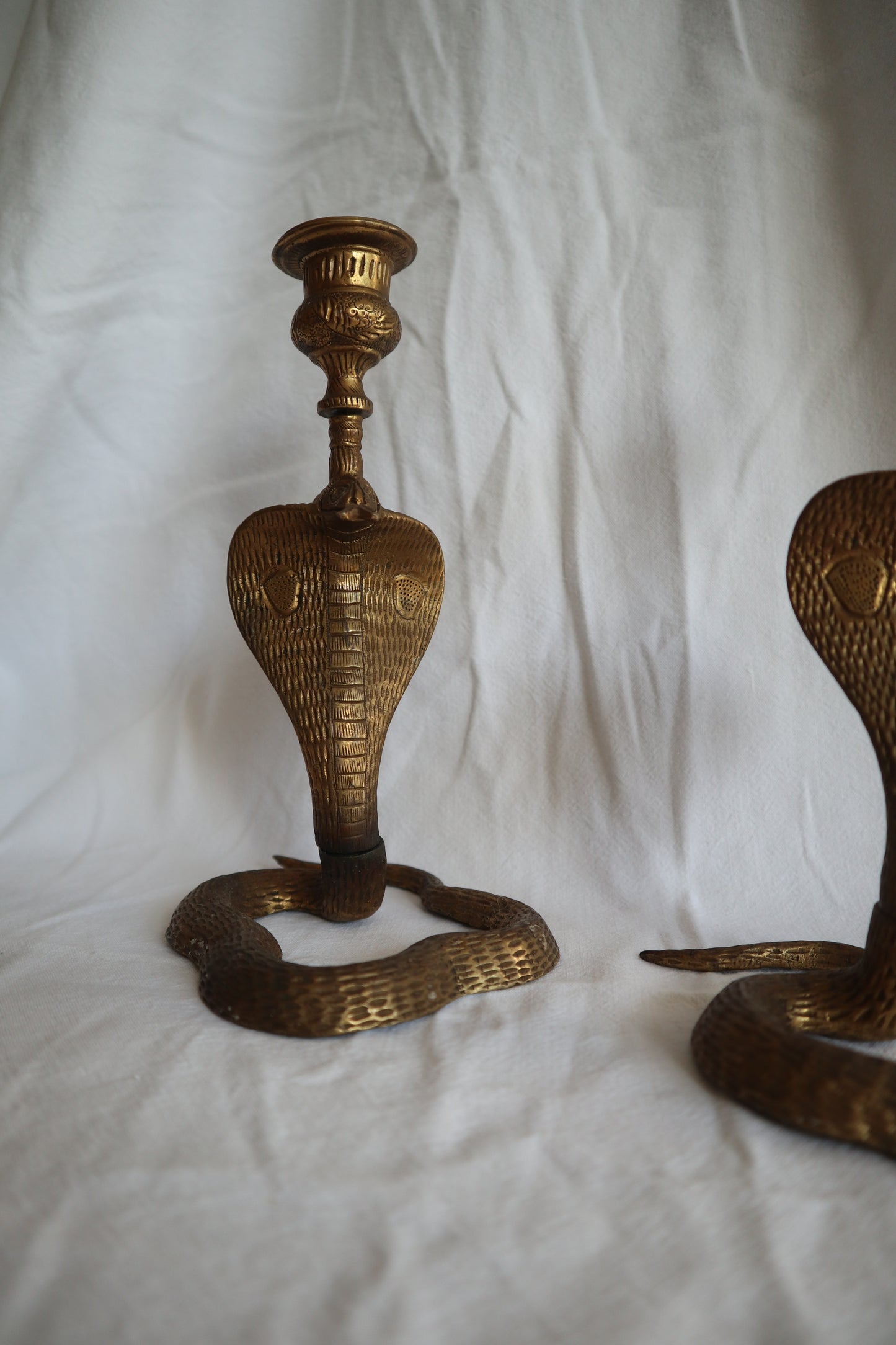 Pair of vintage brass snake candlesticks