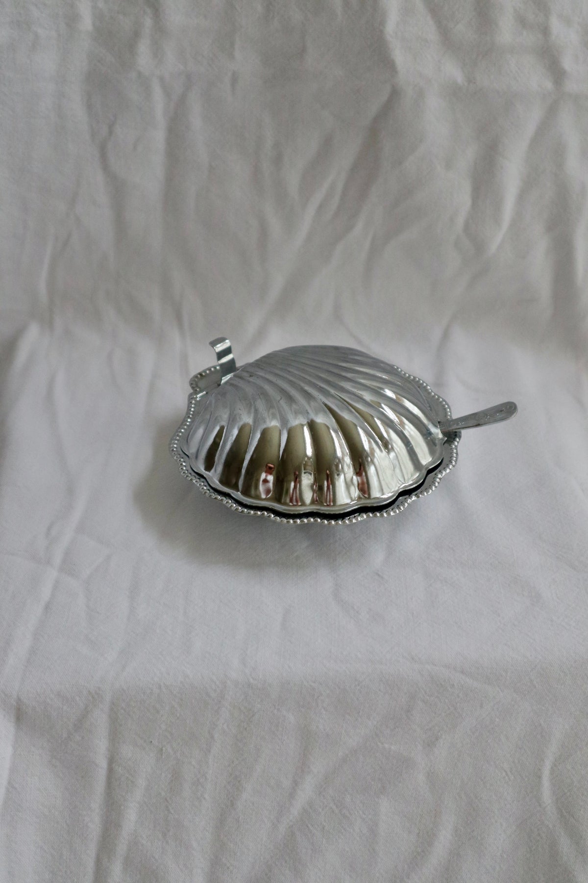 Silver tone and clear glass vintage clamshell dish