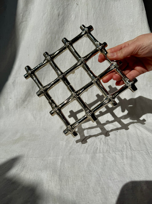 Silver plated extending bamboo trivet