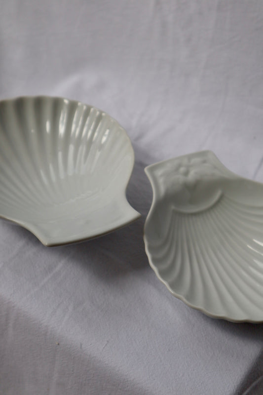 Set of nesting white porcelain shells