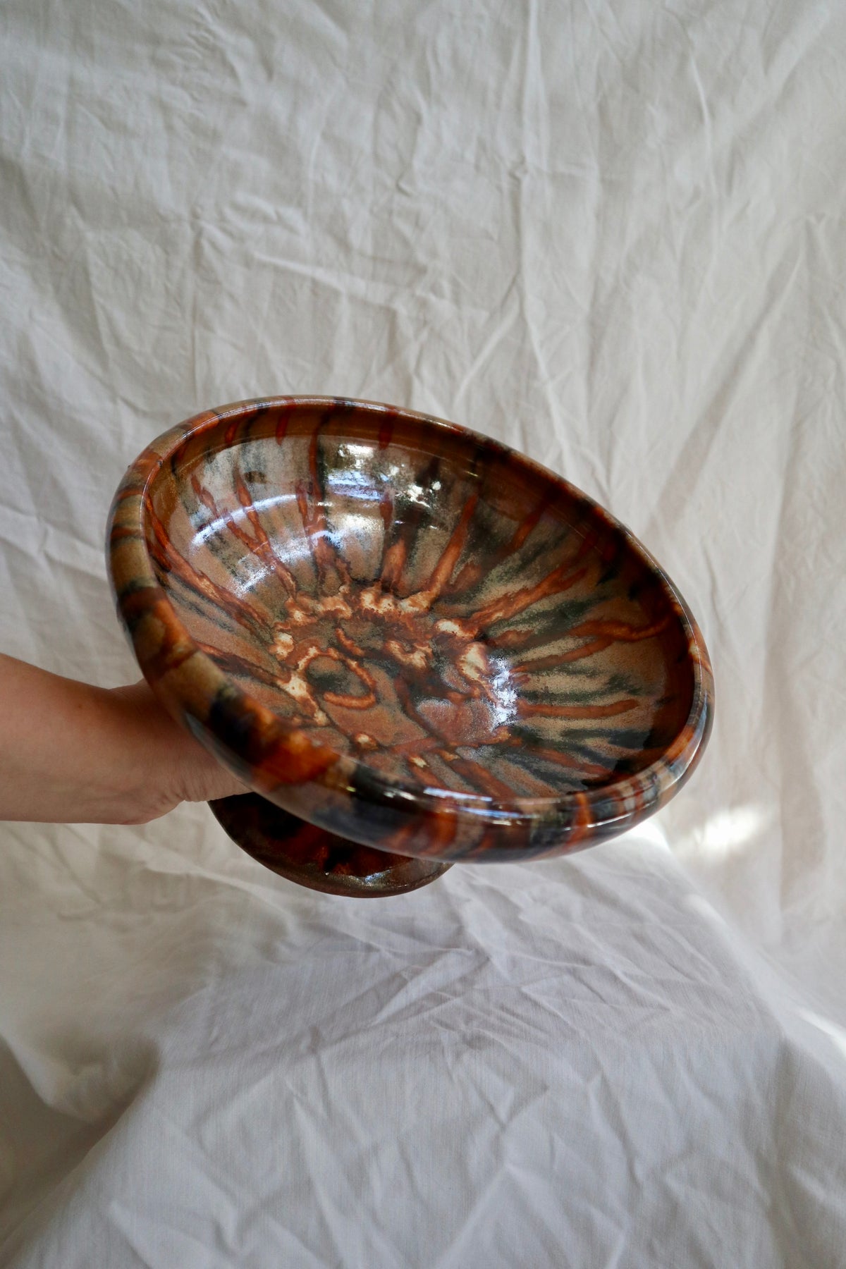 Tortoiseshell glaze slipware pedestal bowl