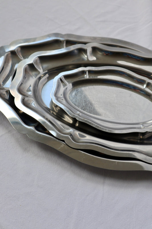Bundle of 3 stainless steel hosting platters with scalloped edges