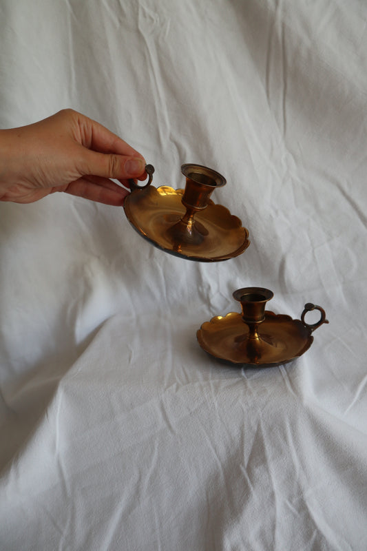 Pair of scalloped brass candlestick holders