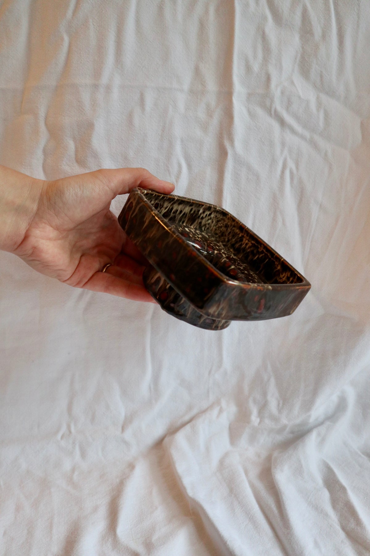Mid-century studio pottery slipware pedestal dish