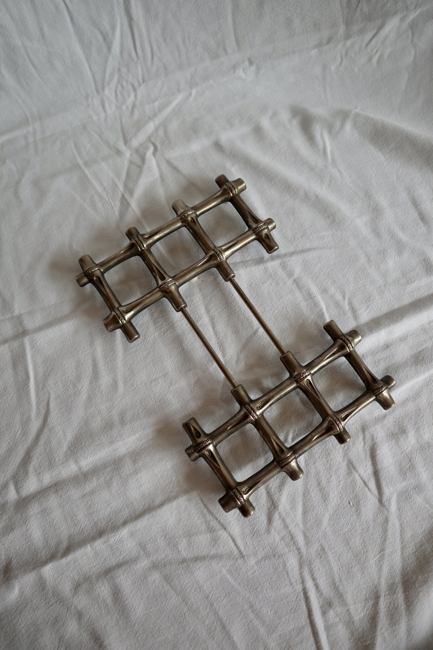 Expanding vintage silver faux bamboo trivet