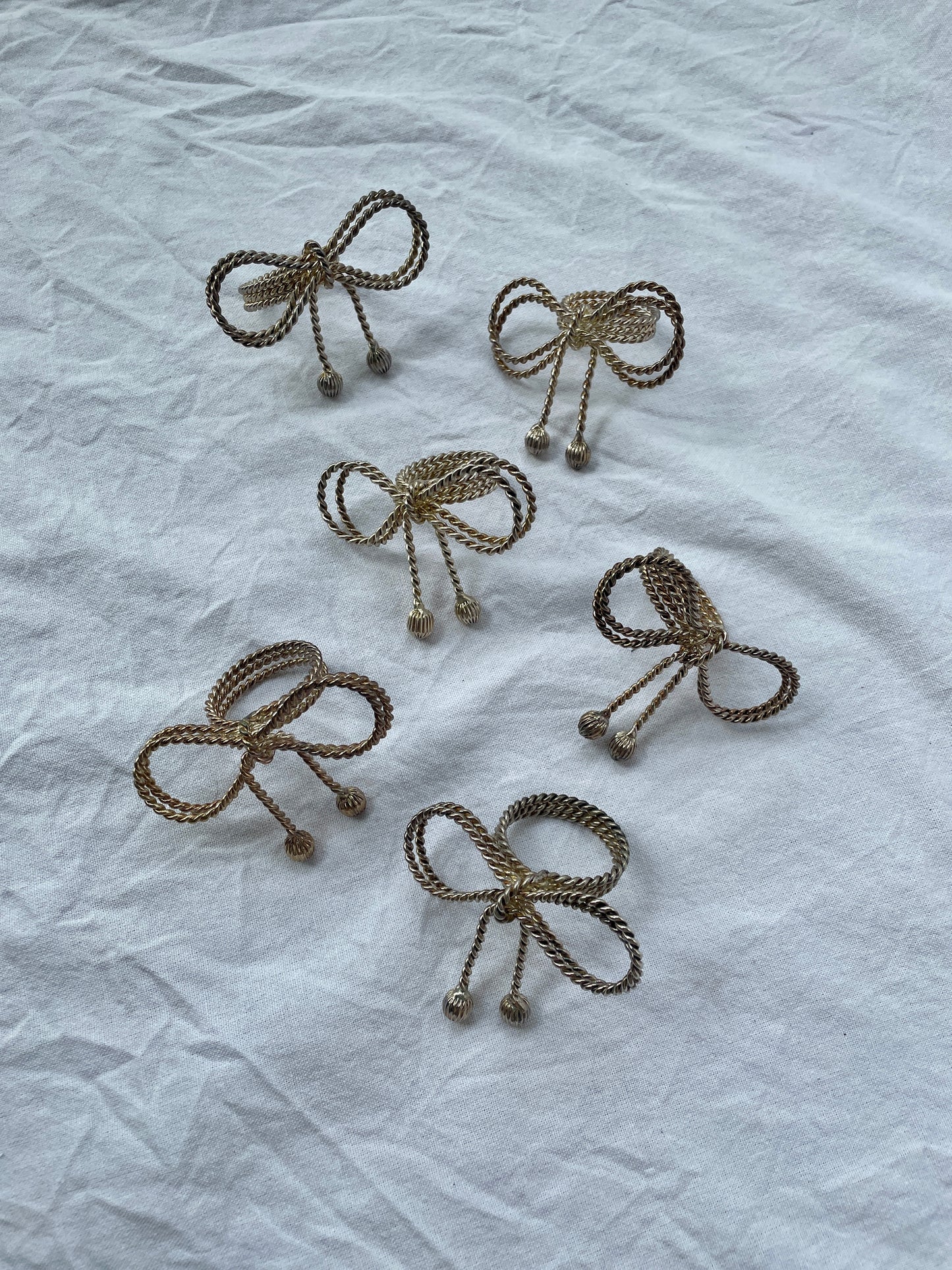 Braided bow napkin rings