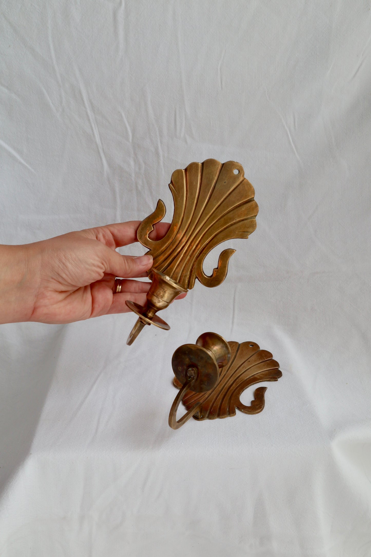 Pair of solid brass scalloped Rococo-style candle sconces