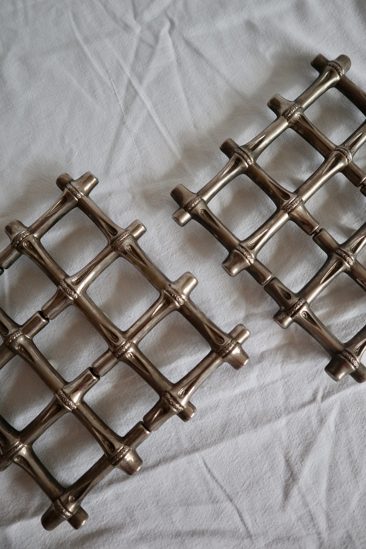 Expanding vintage silver faux bamboo trivet