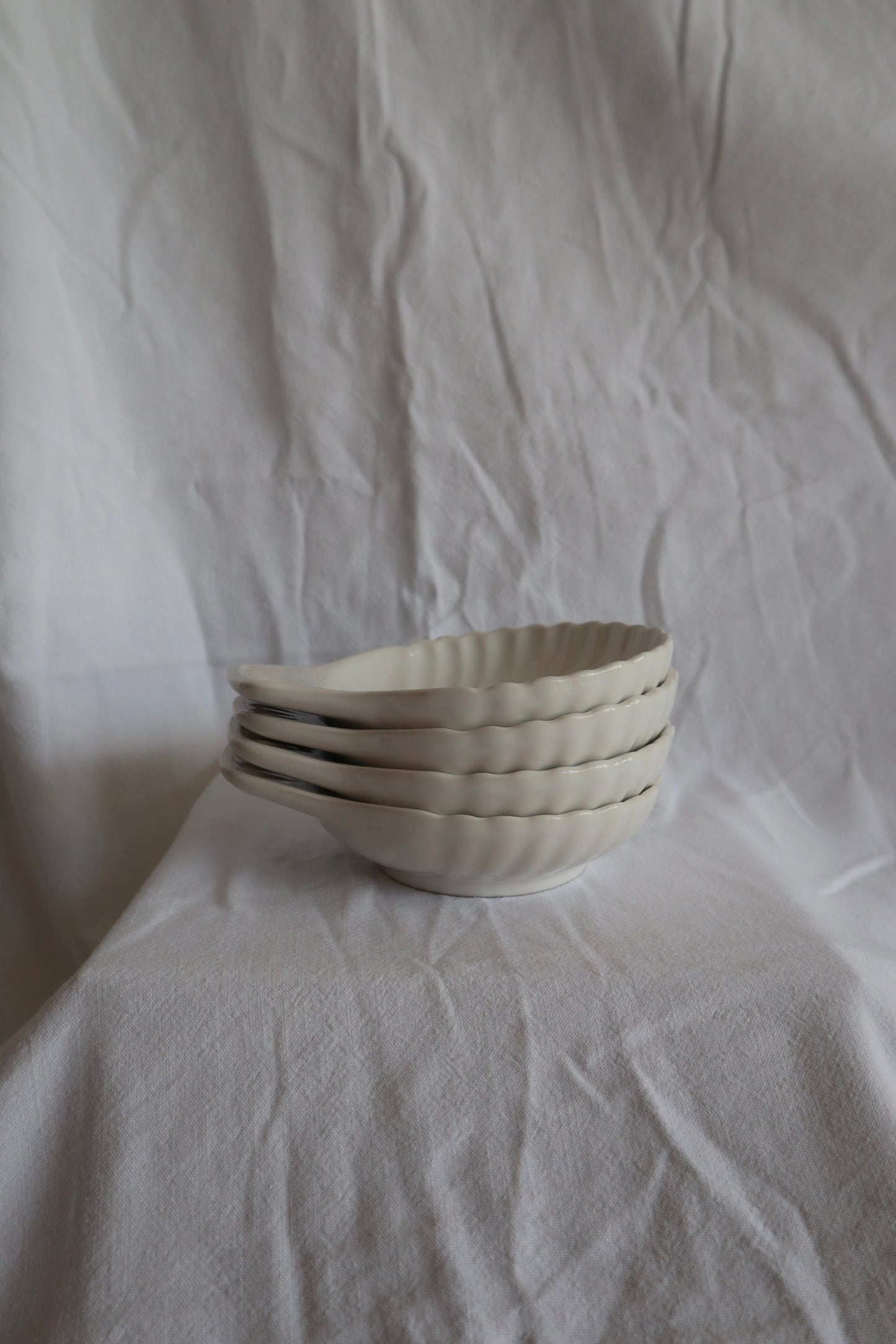 Set of 4 French vintage ceramic shell dishes