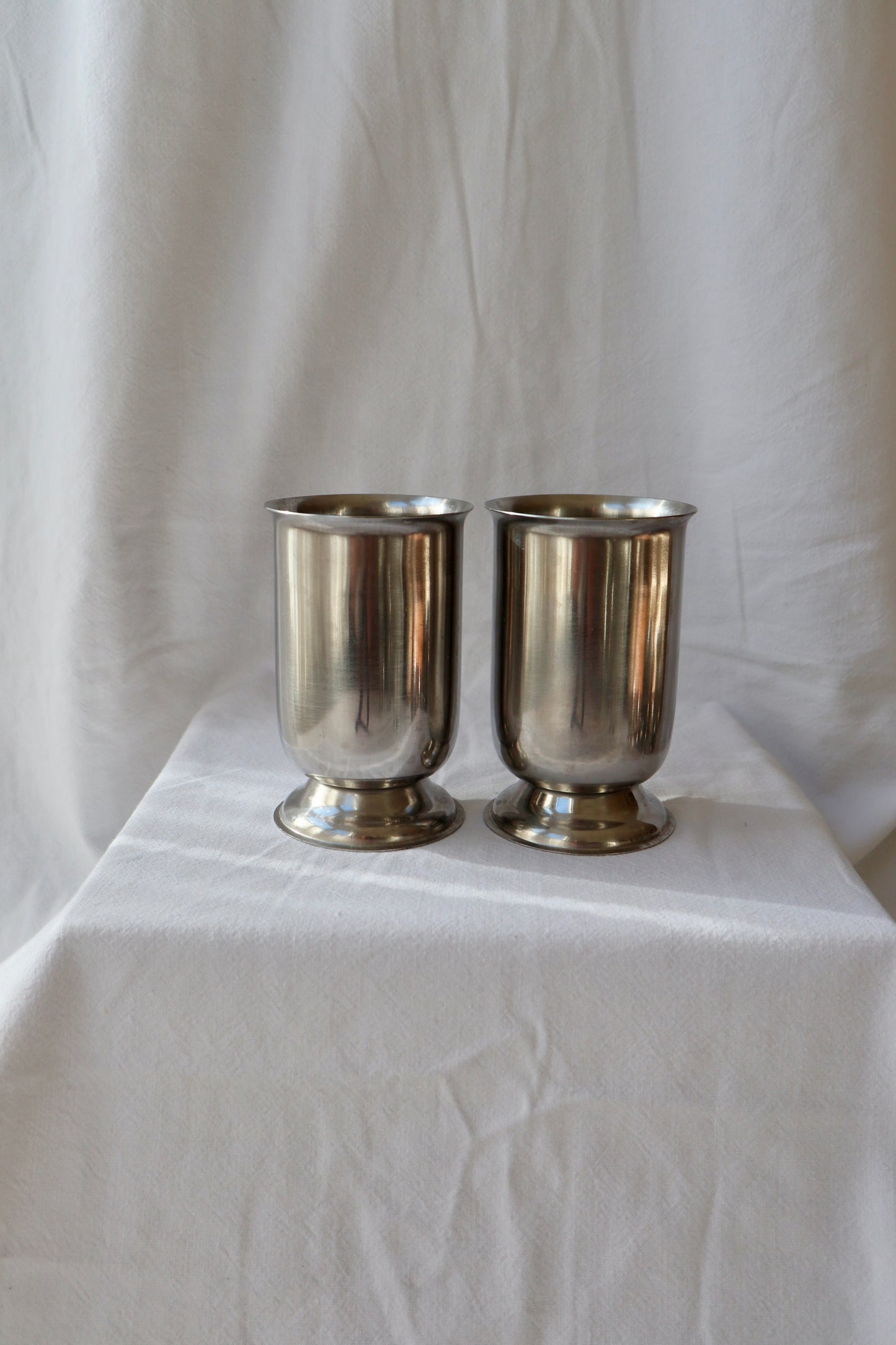 Set of 4 stainless steel mid century cups