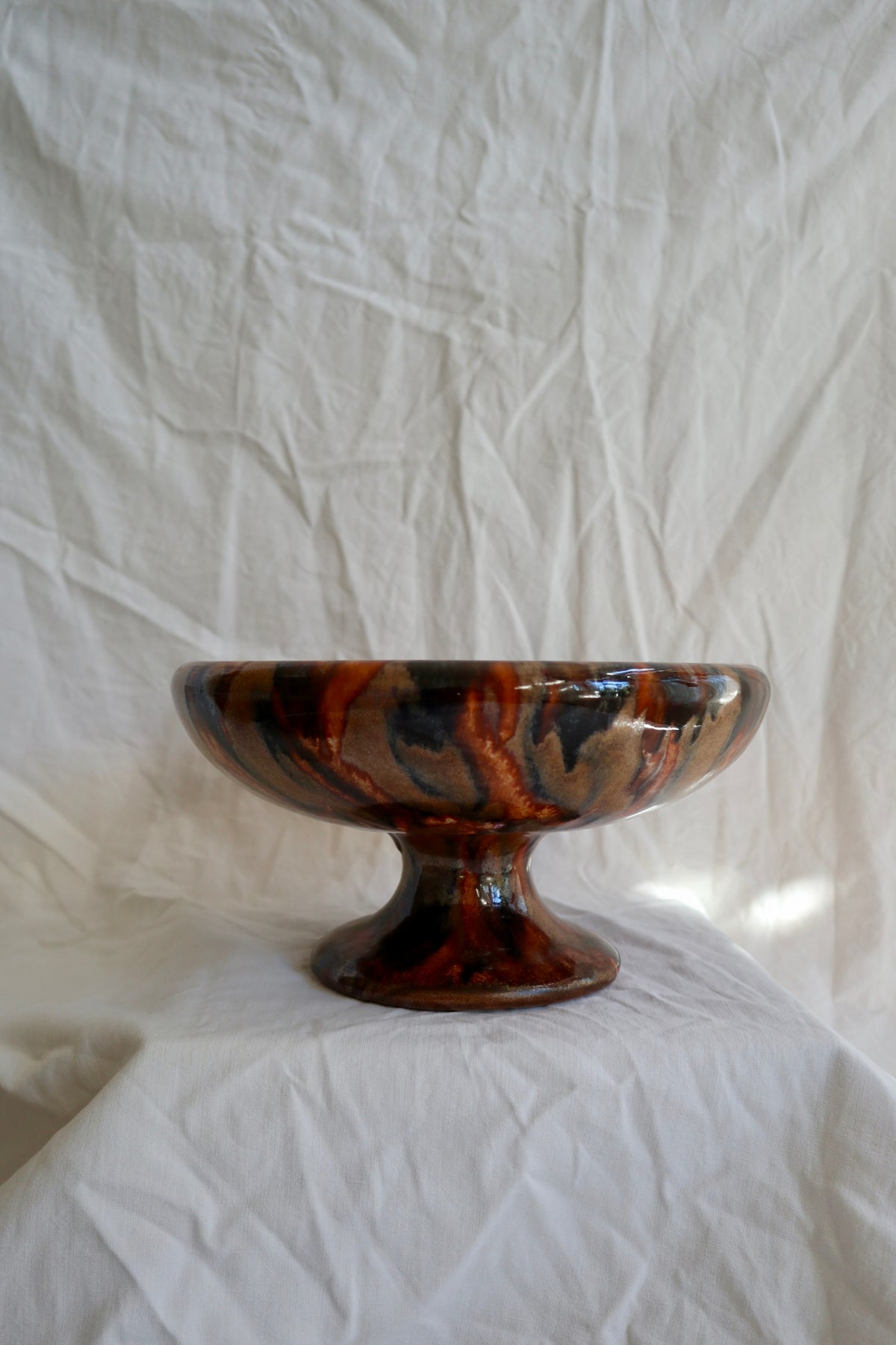 Tortoiseshell glaze slipware pedestal bowl