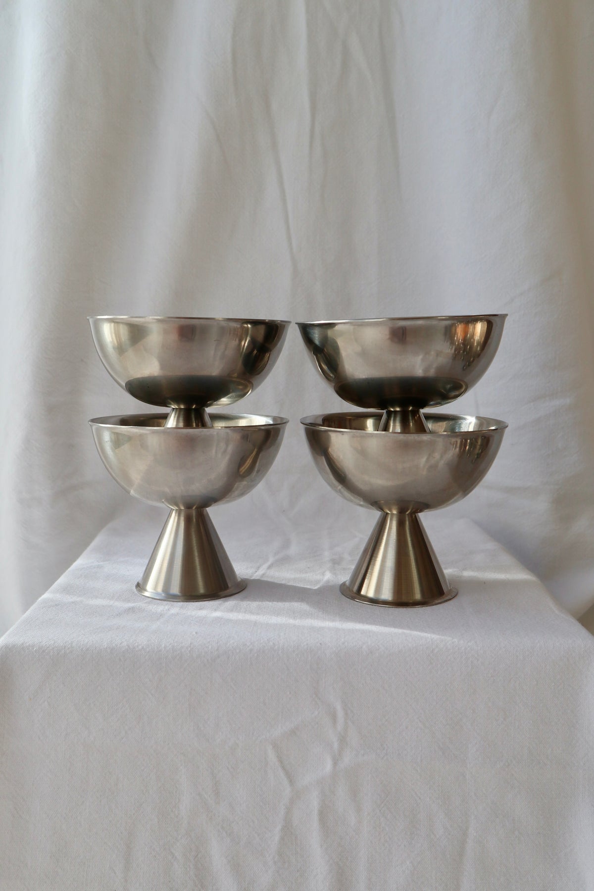 Set of 4 architectural stainless steel coupes