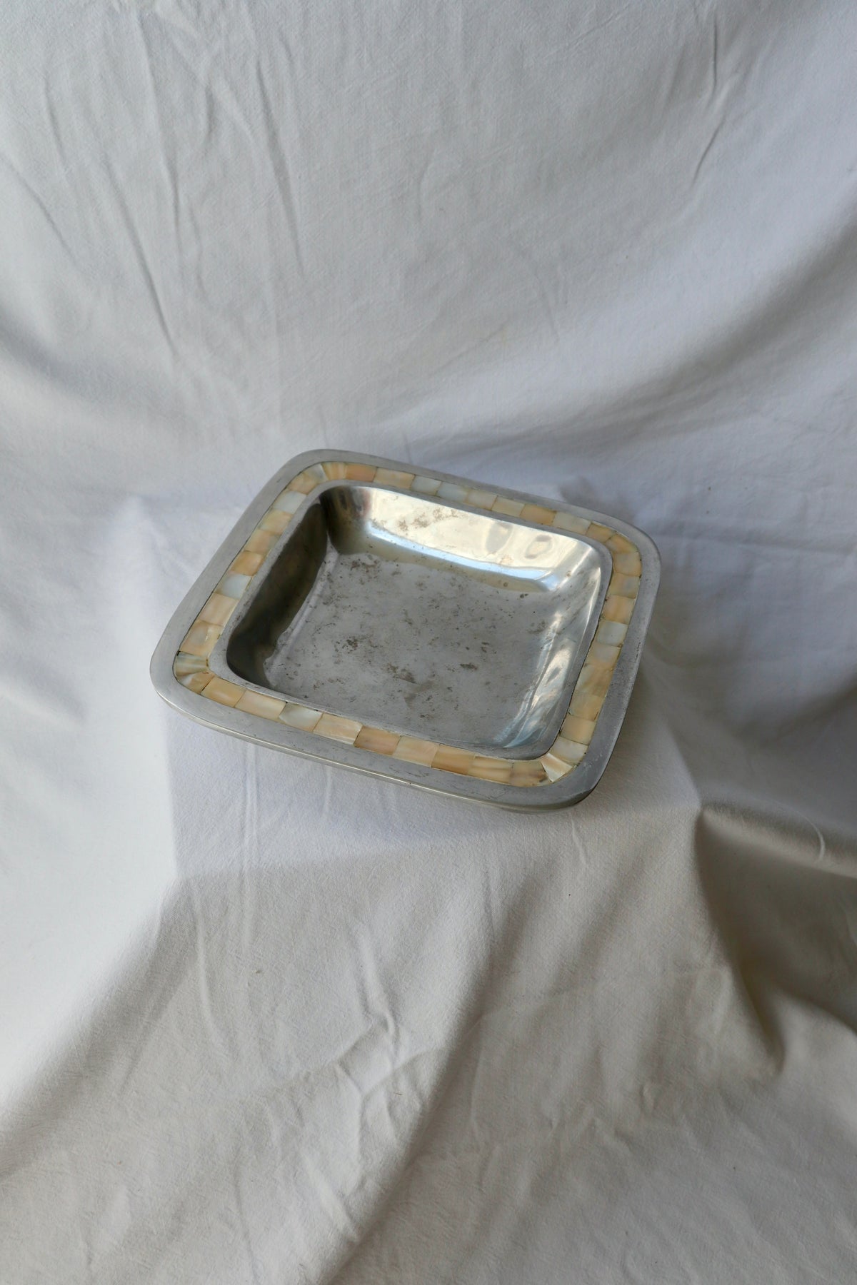 Silver-tone and capiz catch-all dish