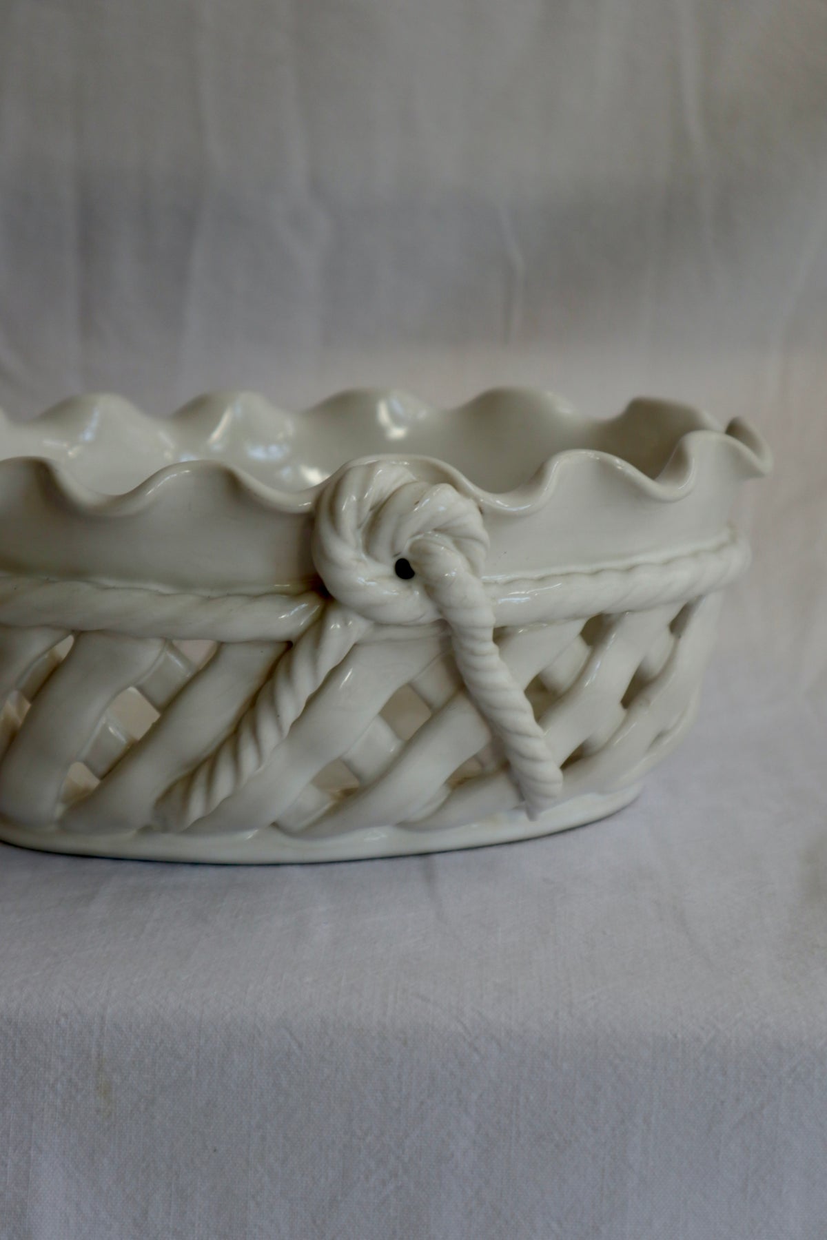 Vintage ceramic woven dish with scalloped rim