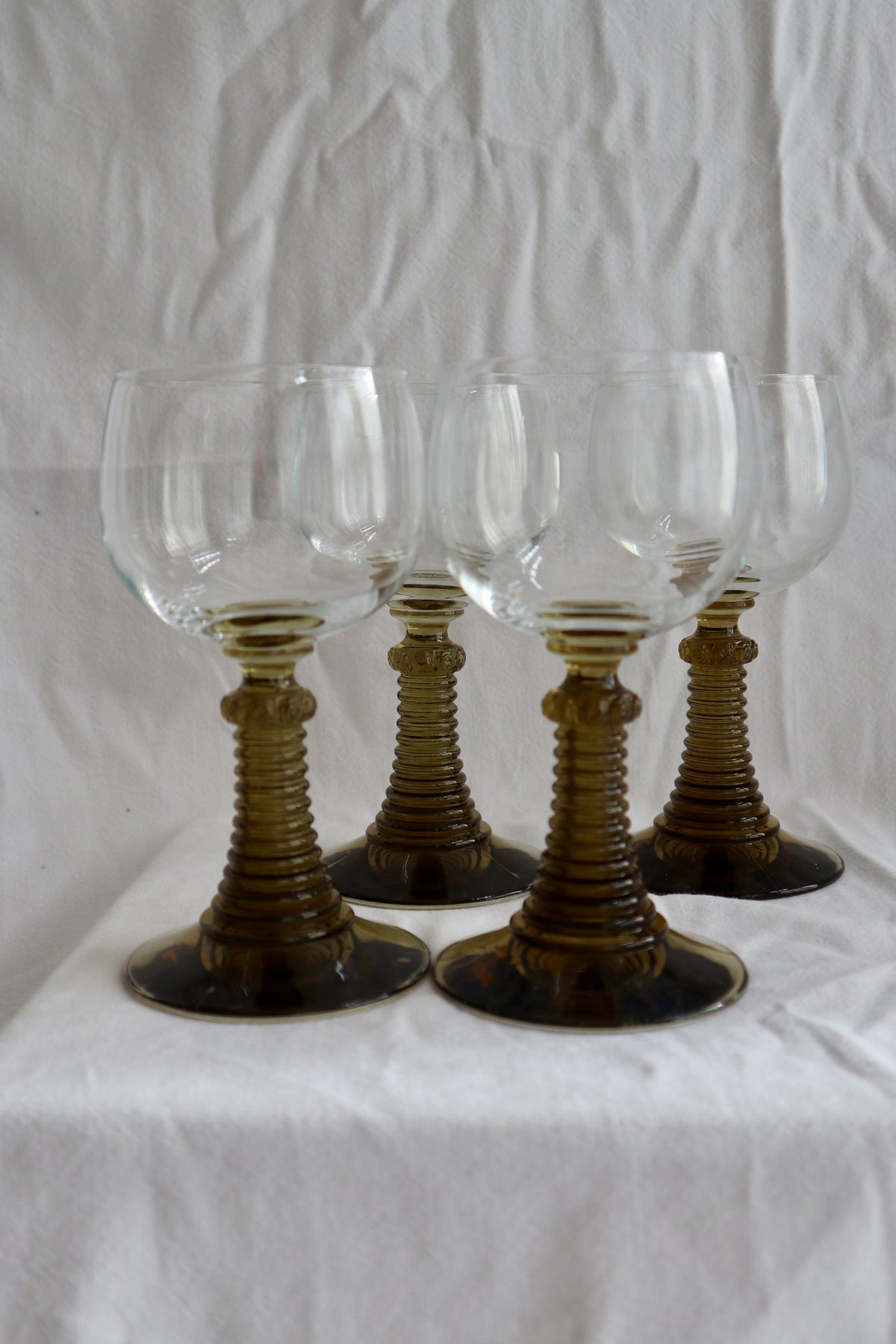 Set of four mid-century wine glasses with bobbin stems