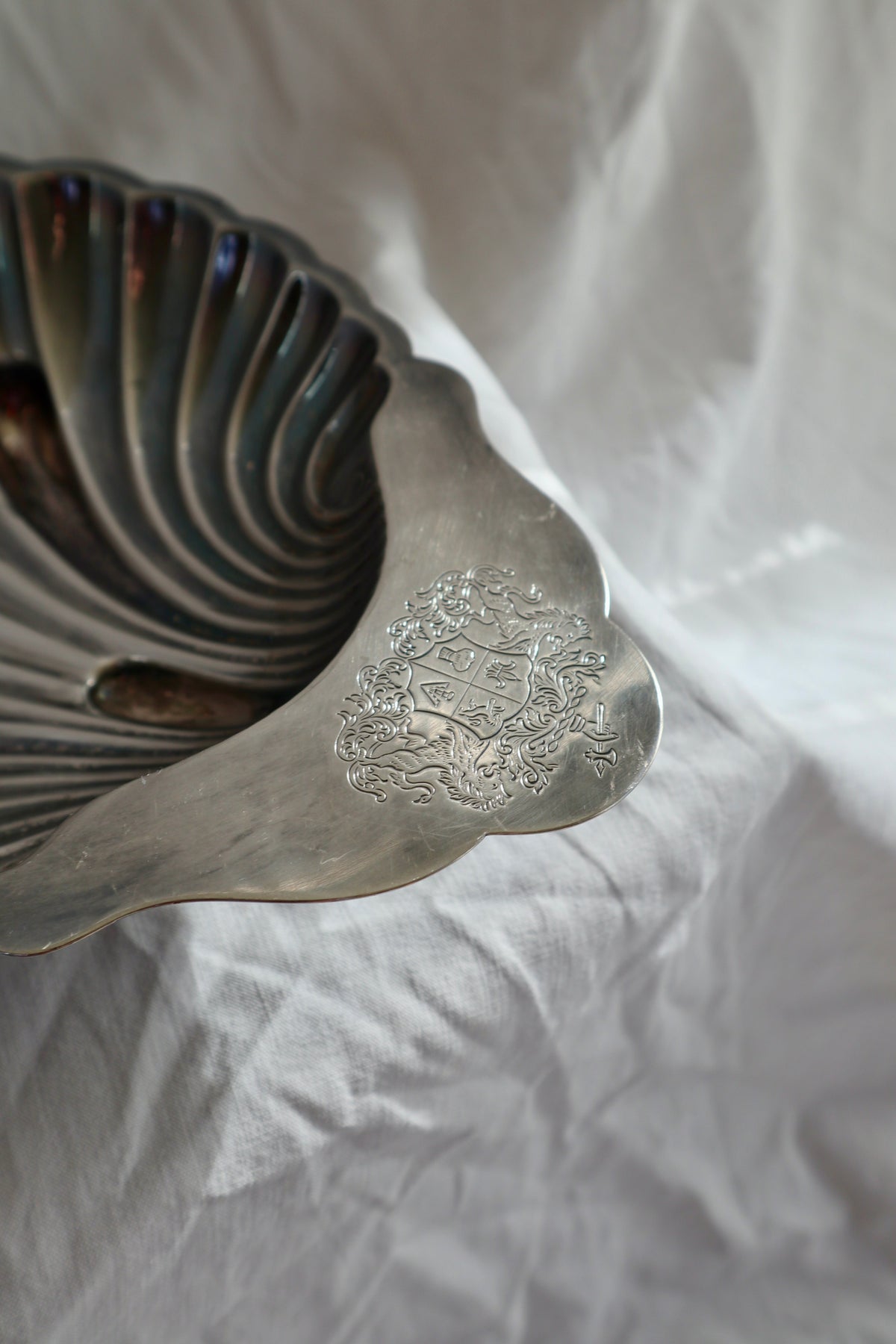 Silver plated shell bowl with engraved crest