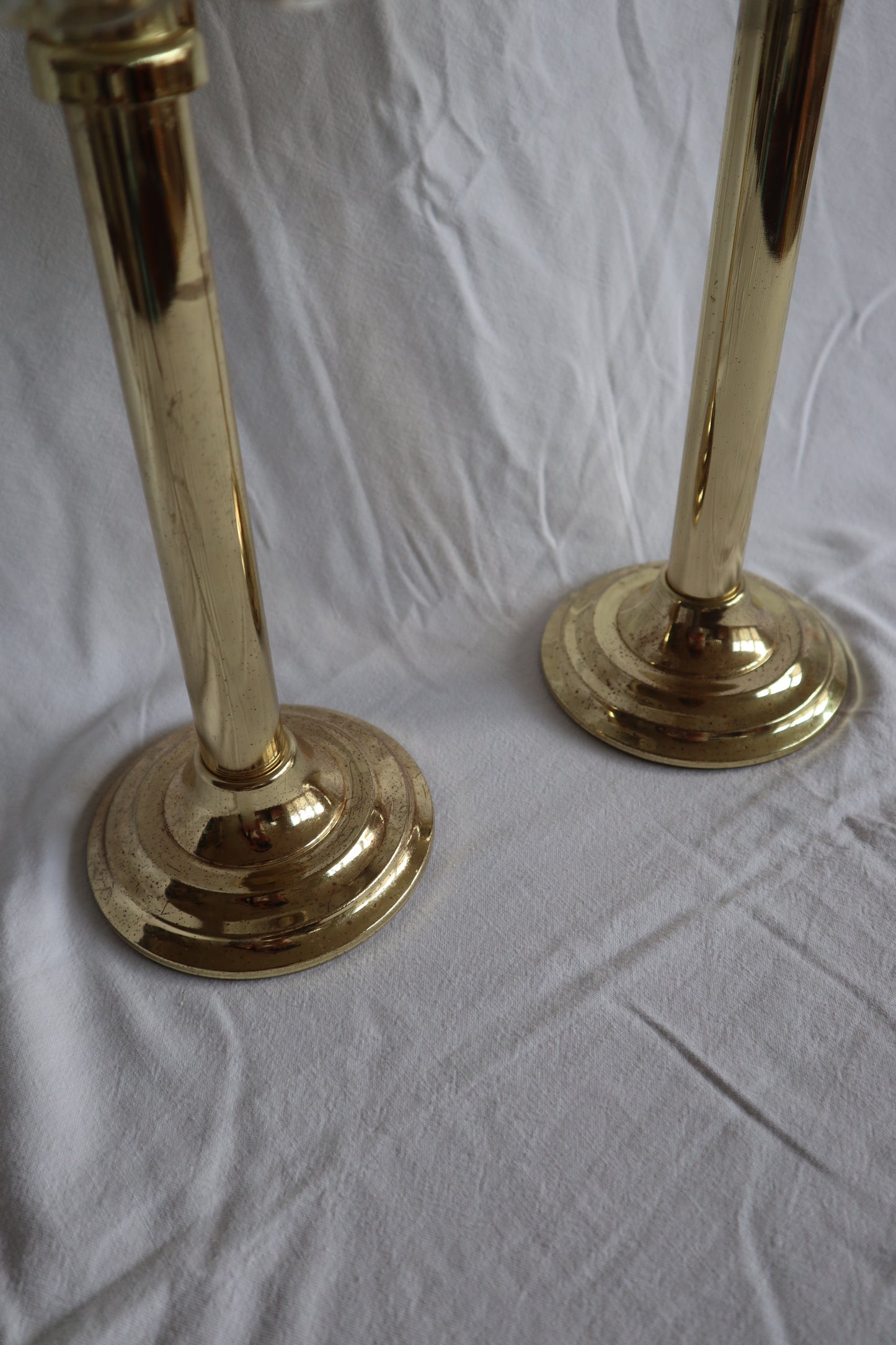 Pair of large brass-tone and ribbed glass vintage candle lamps