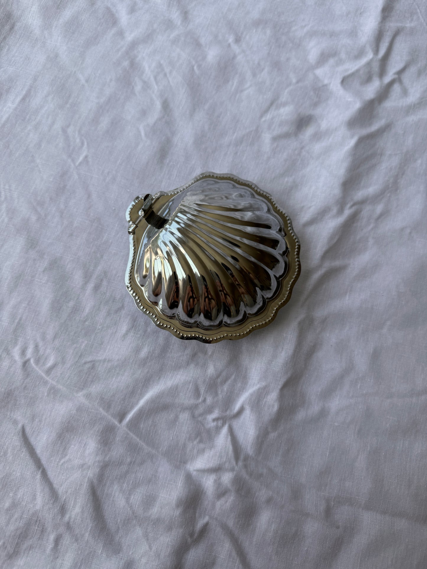Silver plated shell caviar dish with cobalt blue glass insert
