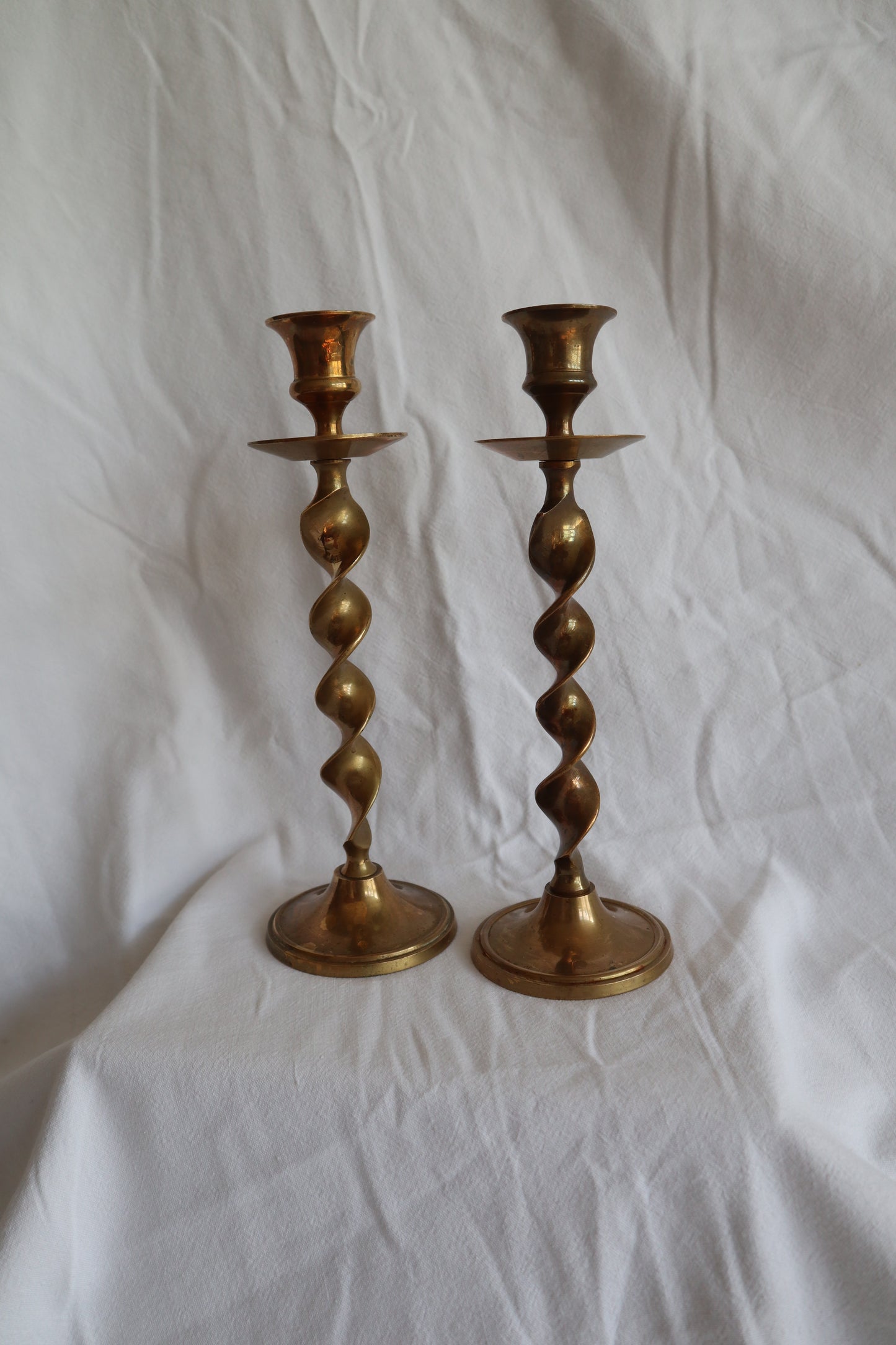 Pair of brass twisted candlestick holders