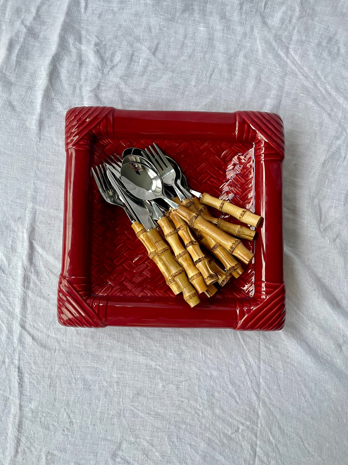 Red rattan effect platter