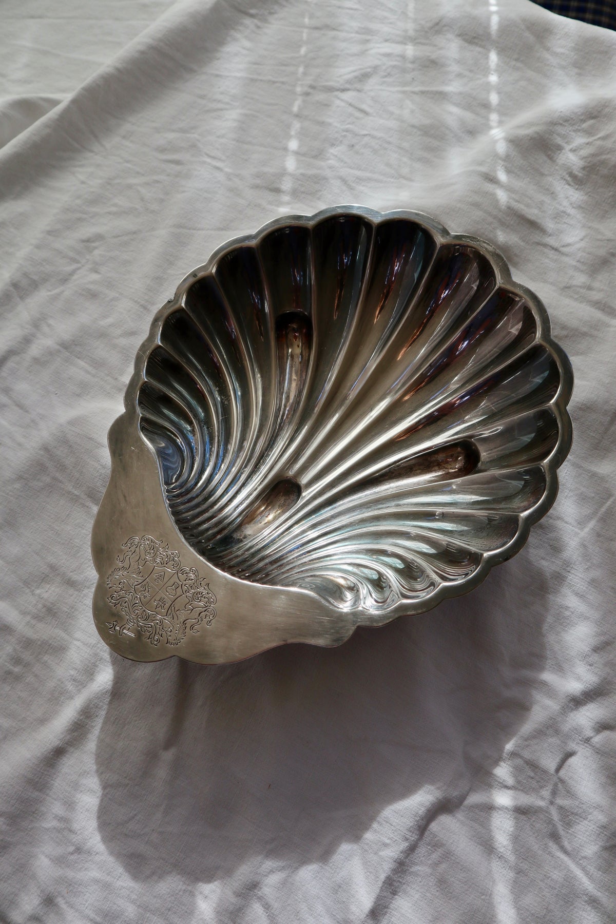 Silver plated shell bowl with engraved crest