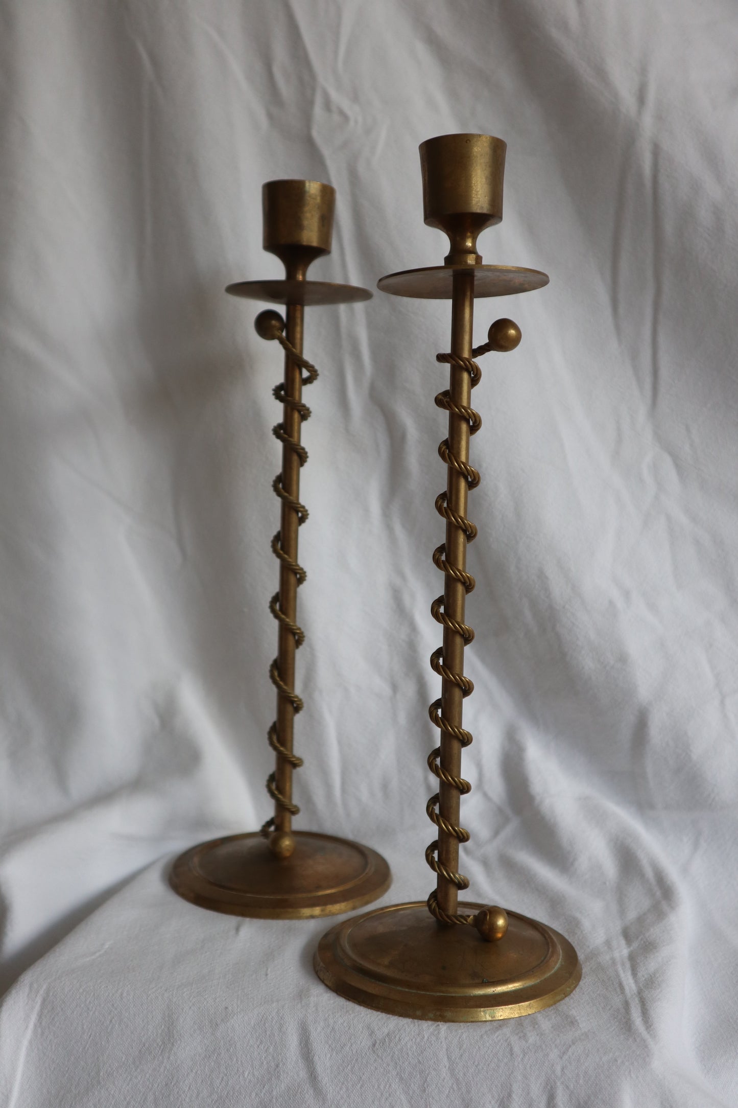 Braided, twisted sculptural brass candlesticks