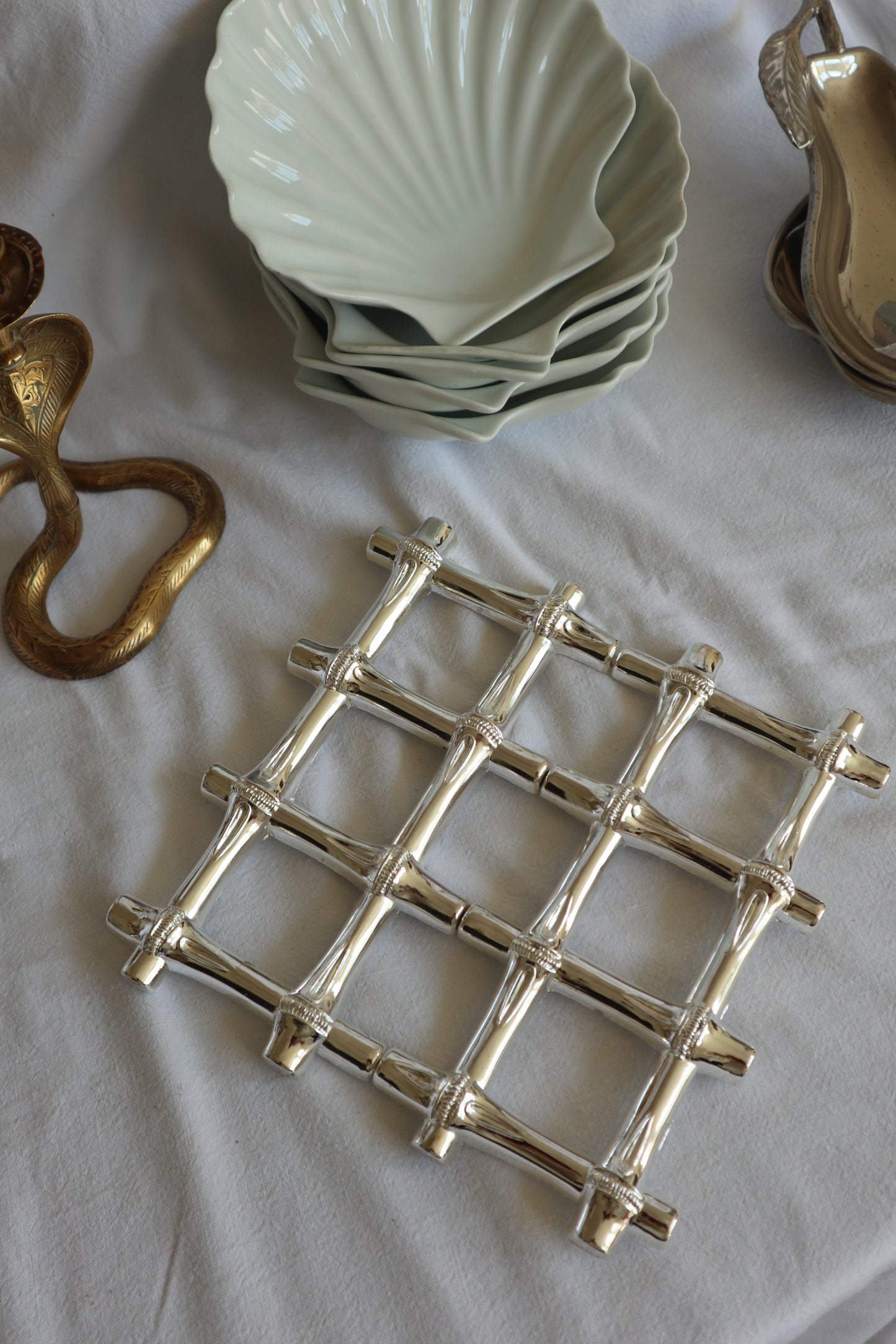 Expanding vintage silver faux bamboo trivet