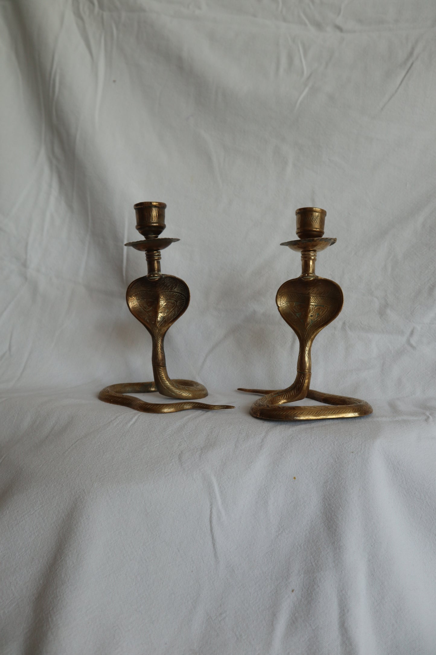 Pair of vintage brass snake candlesticks